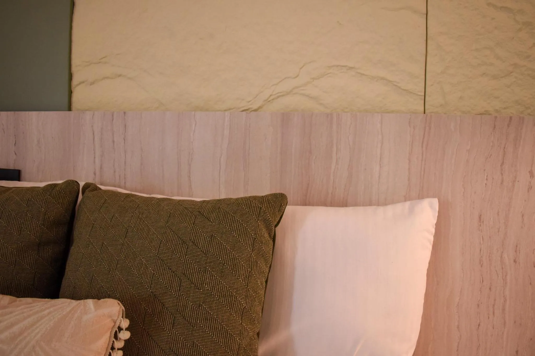 Bed in Hotel Ryo 74B Suites by Growing Group