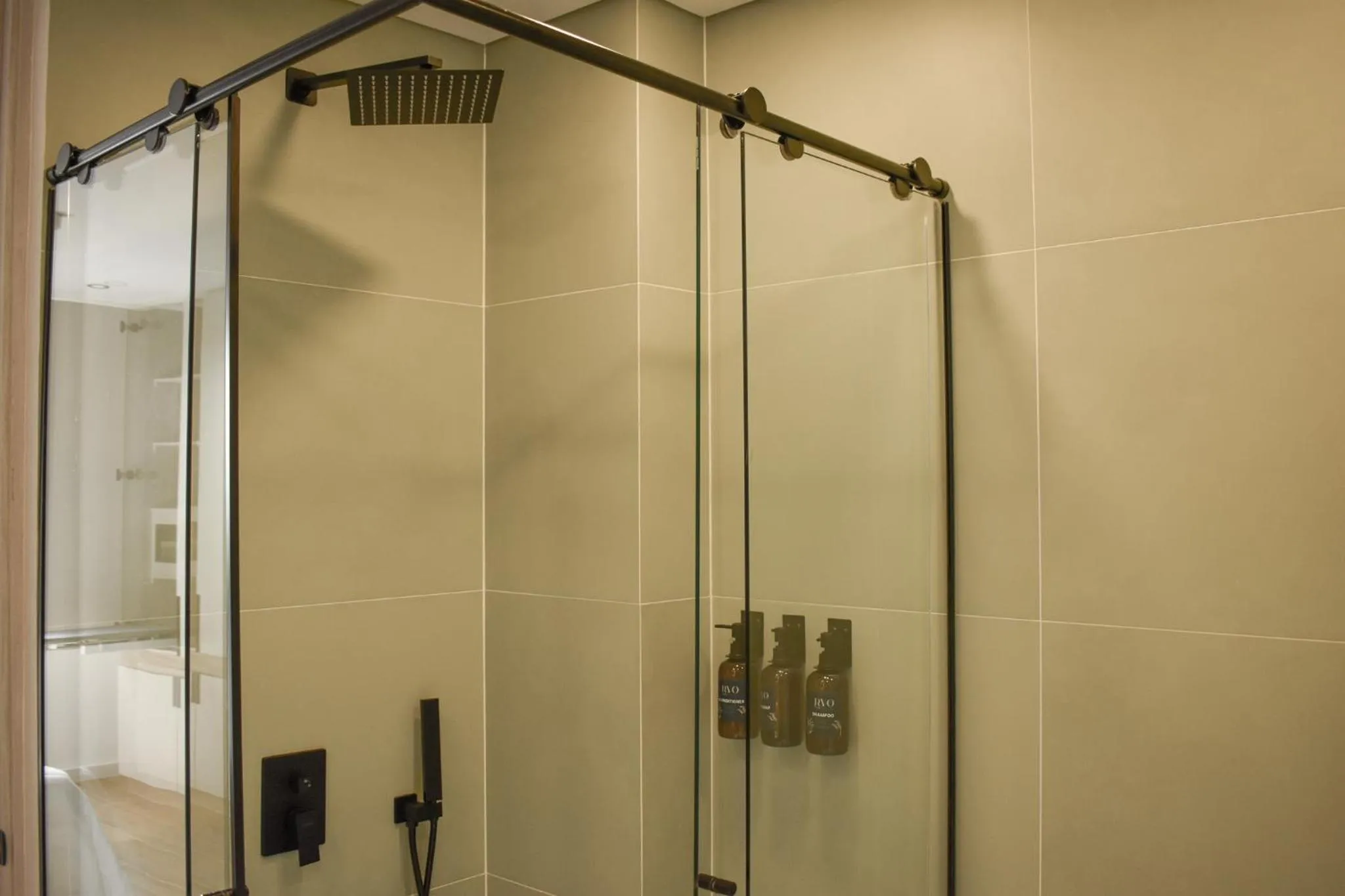 Shower in Hotel Ryo 74B Suites by Growing Group