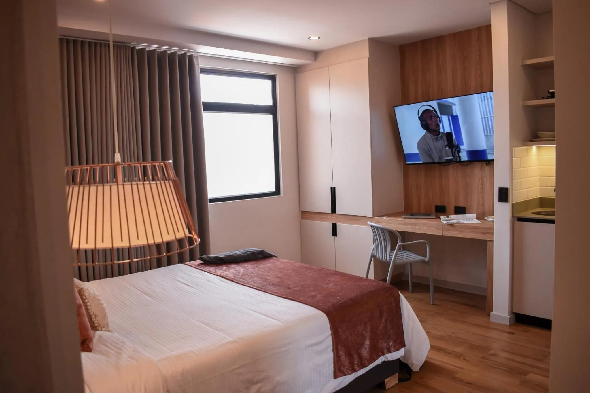 Photo of the whole room, Bed in Hotel Ryo 74B Suites by Growing Group