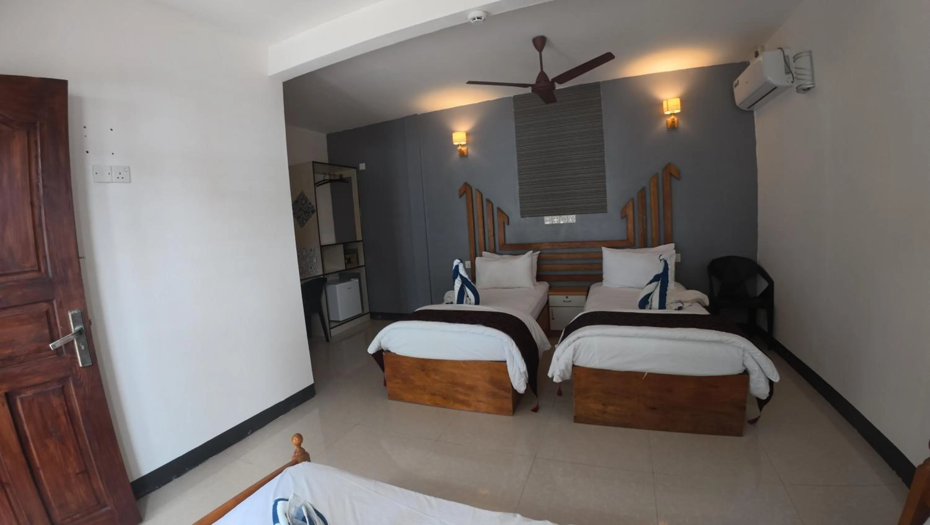 Bed in Liberty Guesthouse Maldives