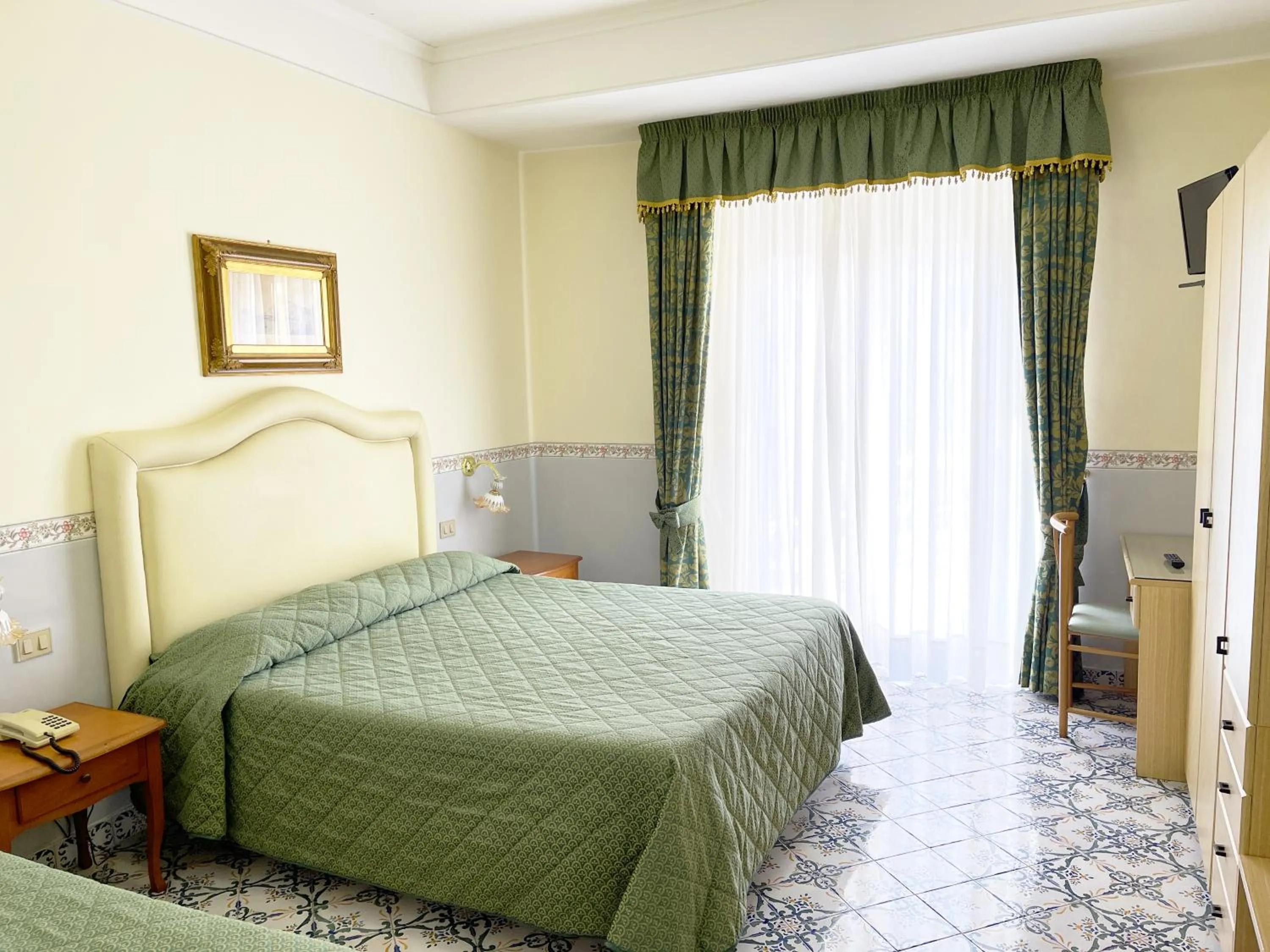 Bedroom in Hotel Reginella