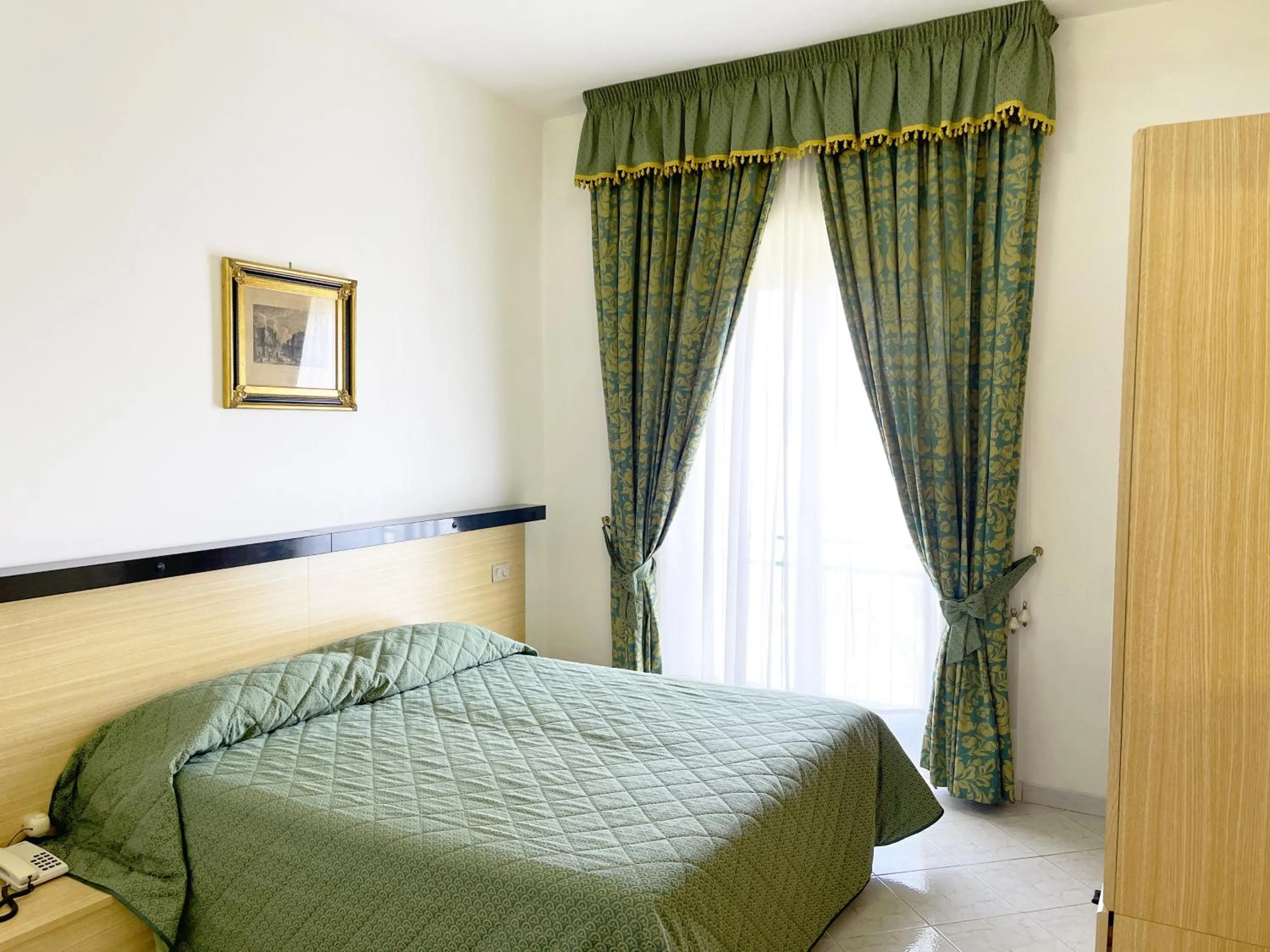 Bedroom in Hotel Reginella