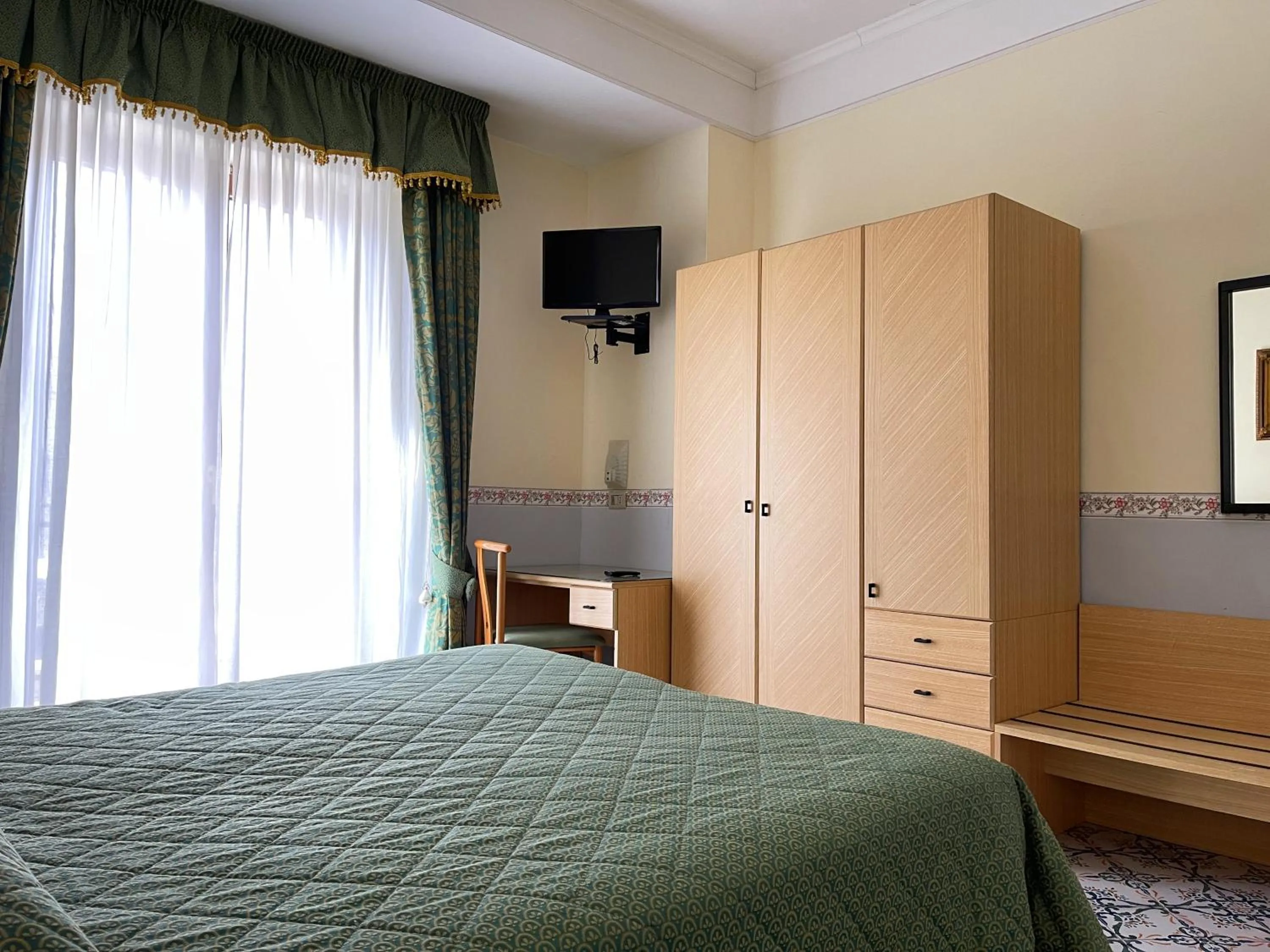 Bedroom in Hotel Reginella