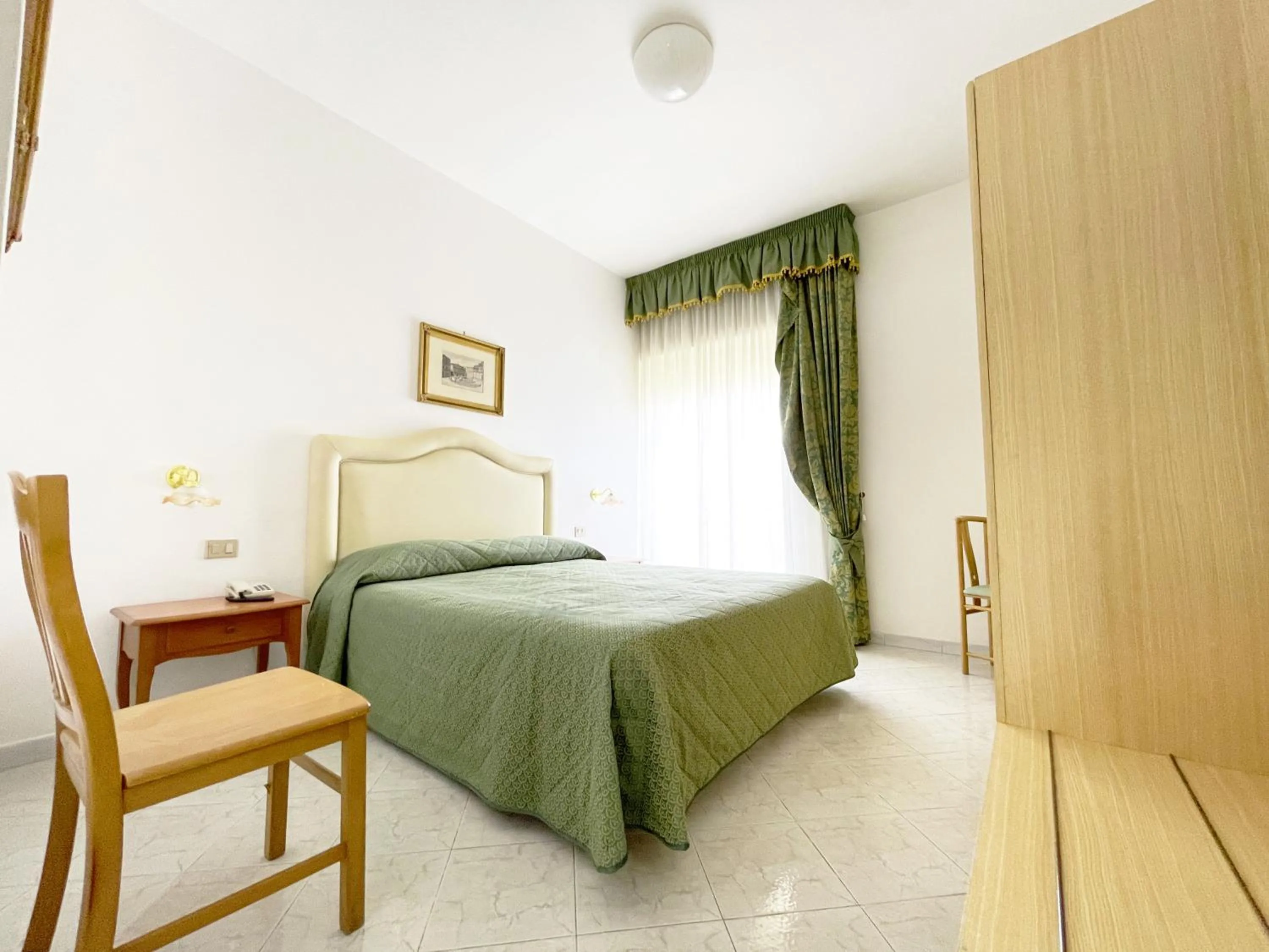 Bed in Hotel Reginella