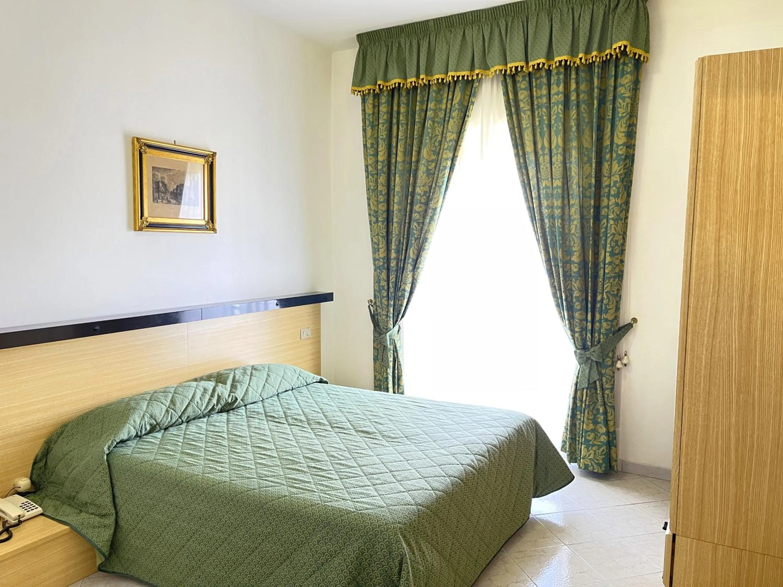 Bed in Hotel Reginella