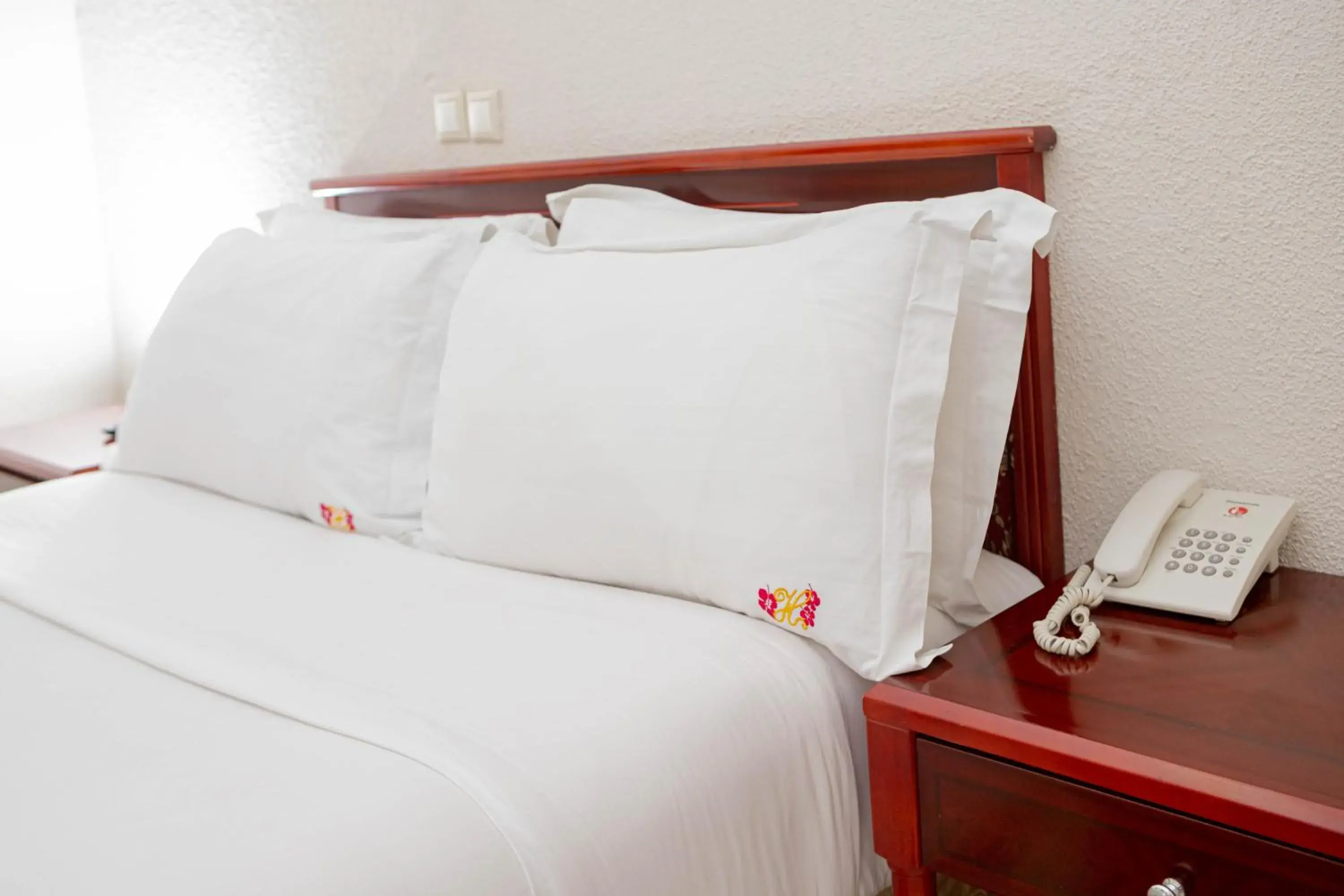 Bed in Hotel Hibiscus Louis Bed in Hotel Hibiscus Louis