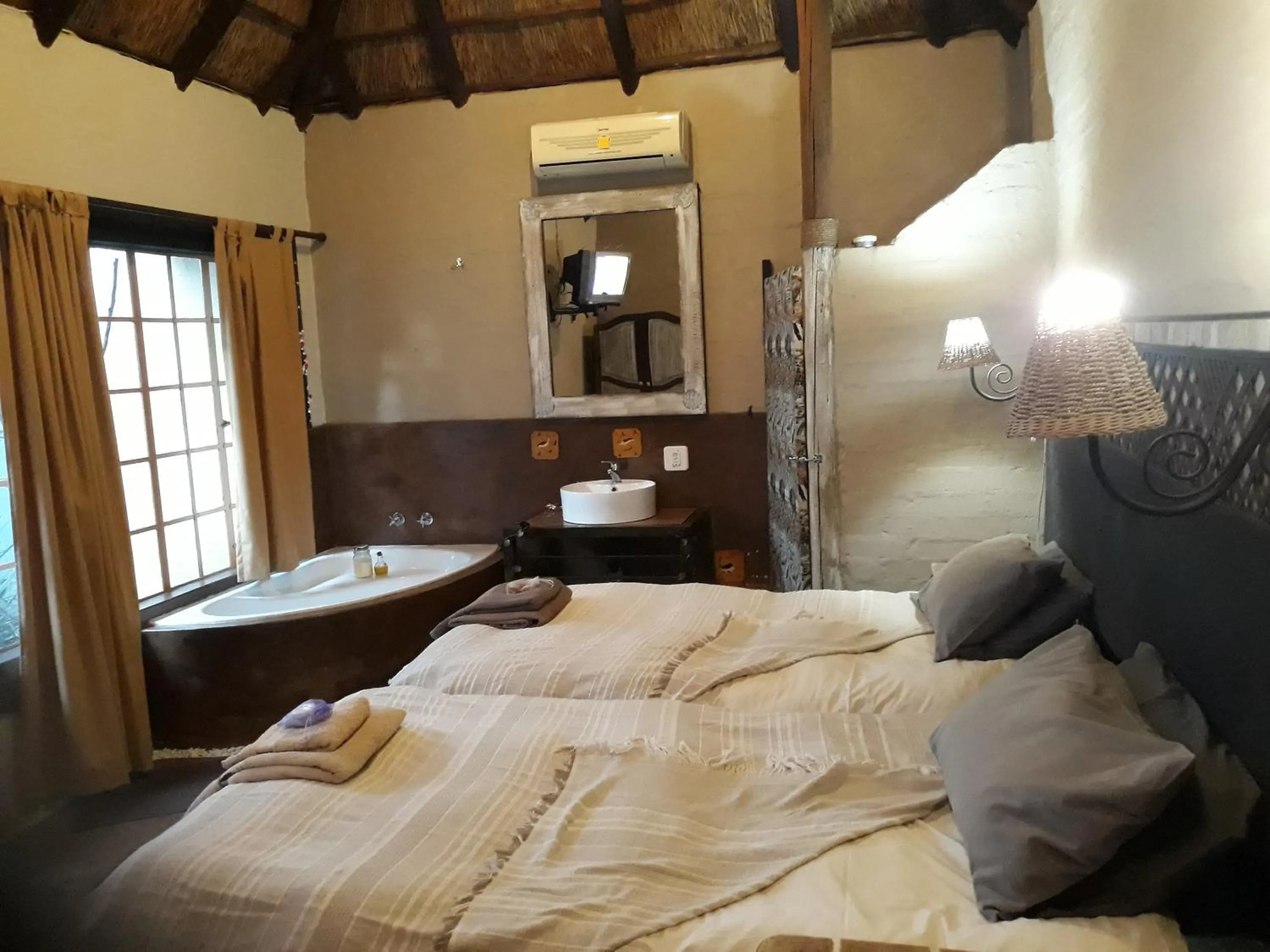 Bed in African Silhouette Guesthouse