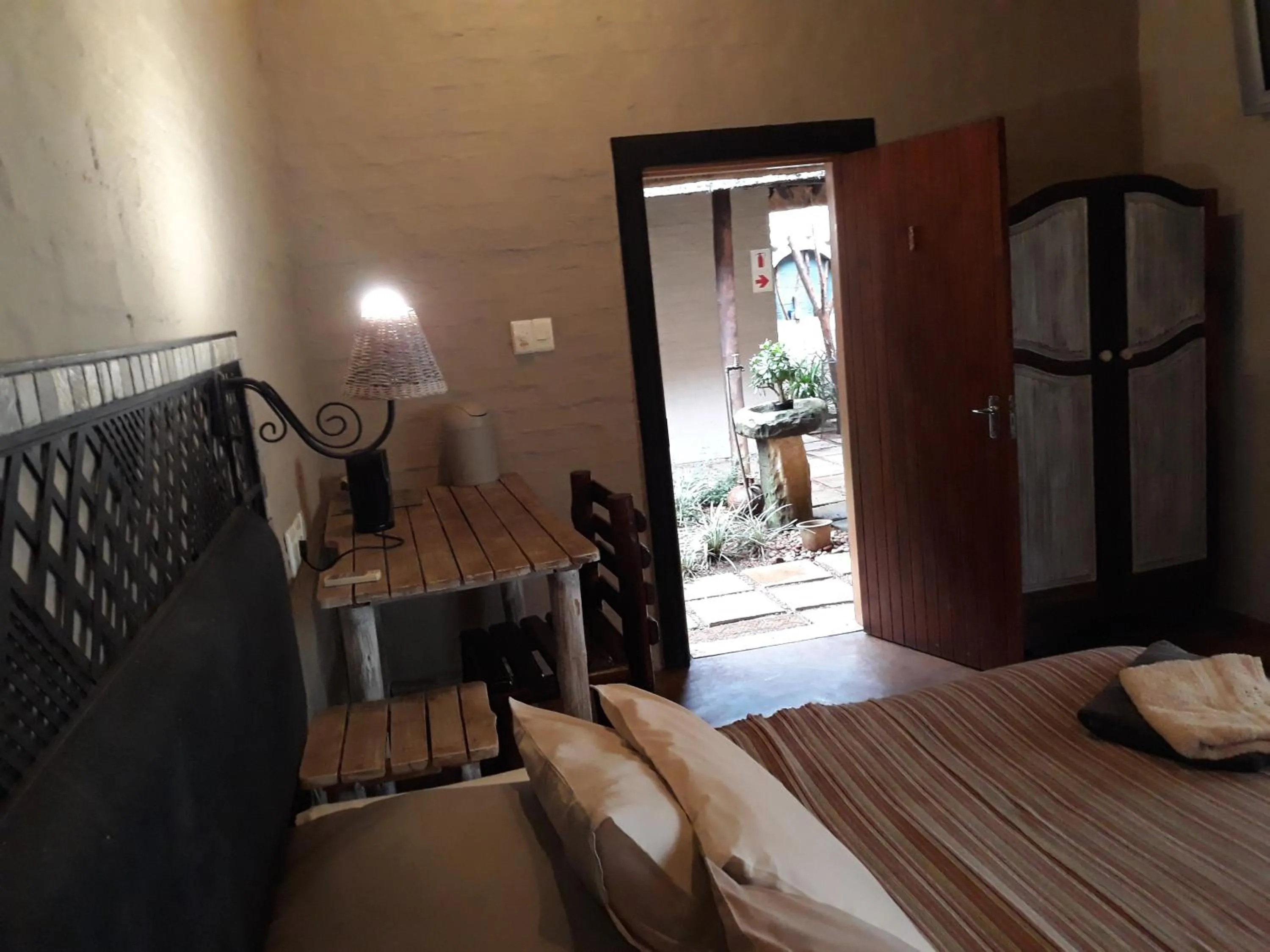 Bed in African Silhouette Guesthouse