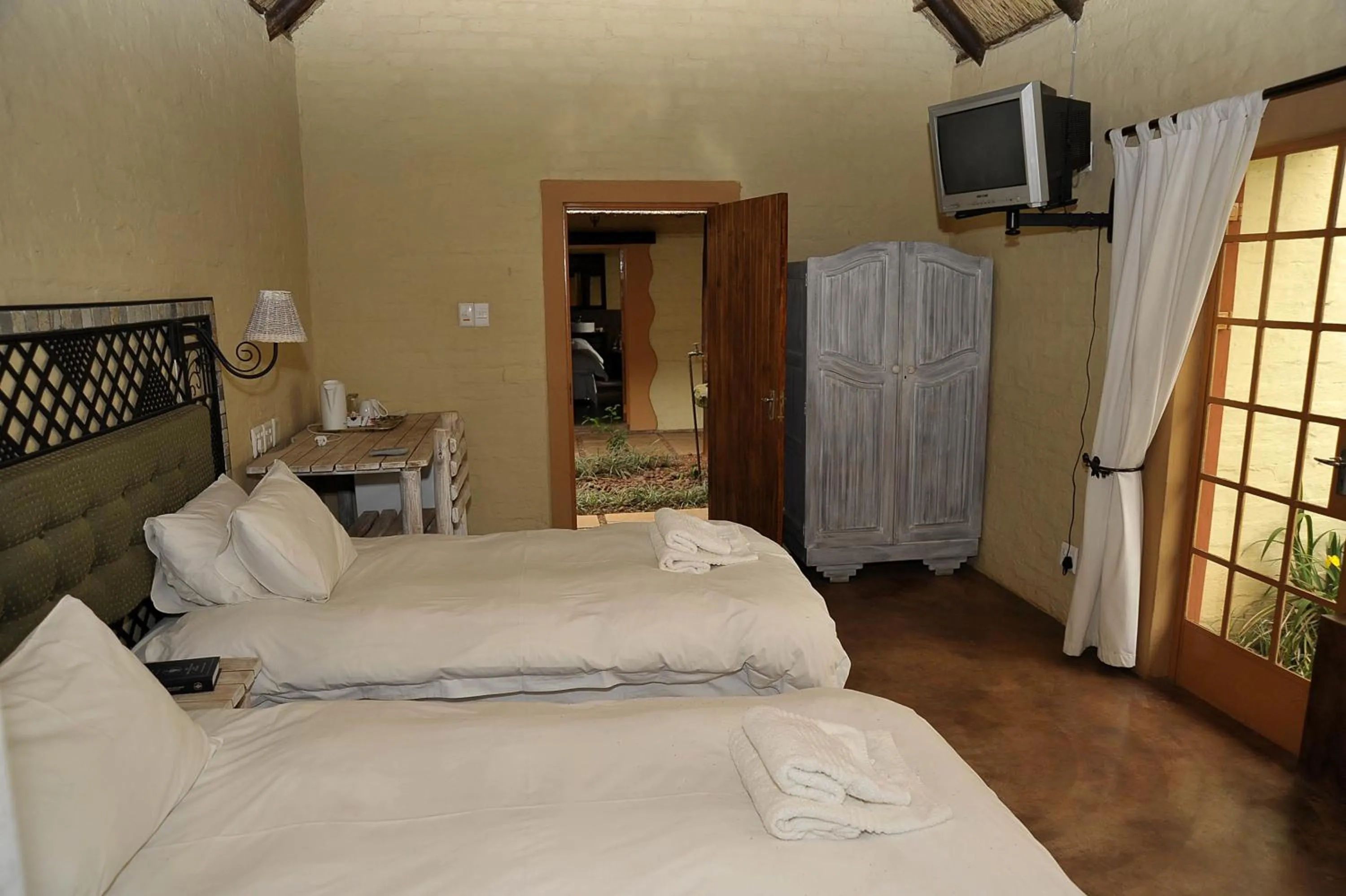 Bed in African Silhouette Guesthouse