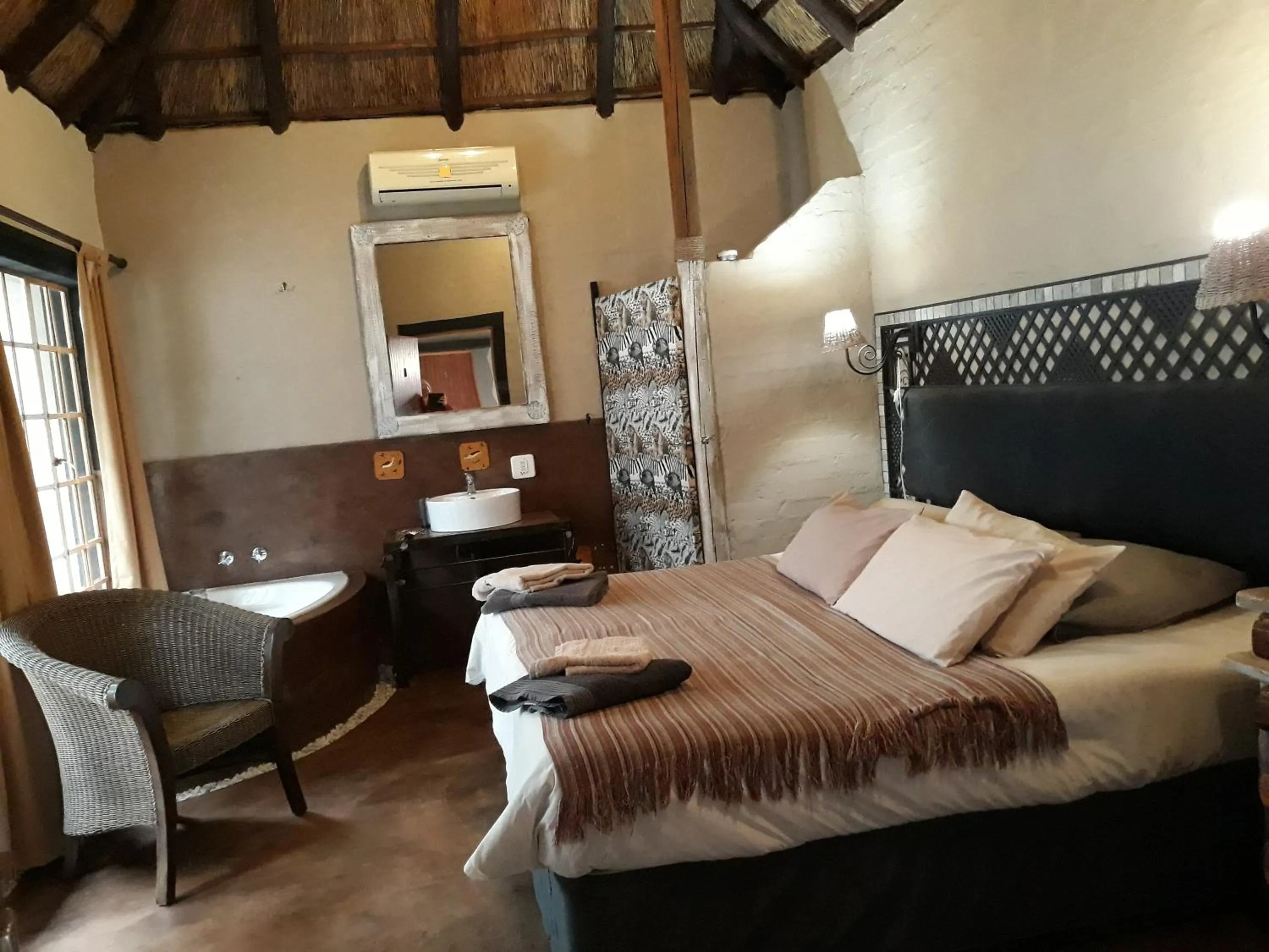 Bed in African Silhouette Guesthouse