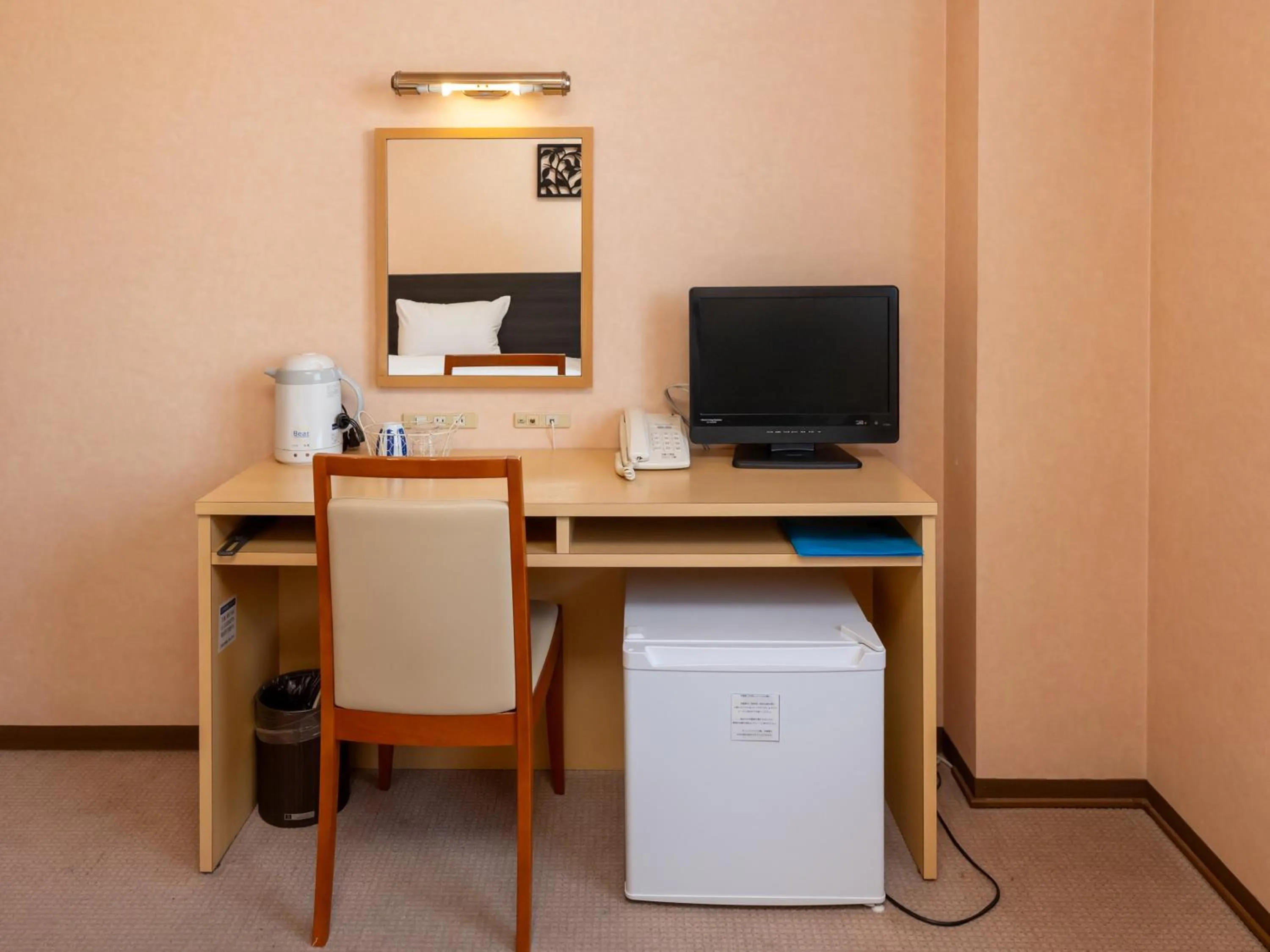 Bed in Tabist Hirosaki Touei Hotel