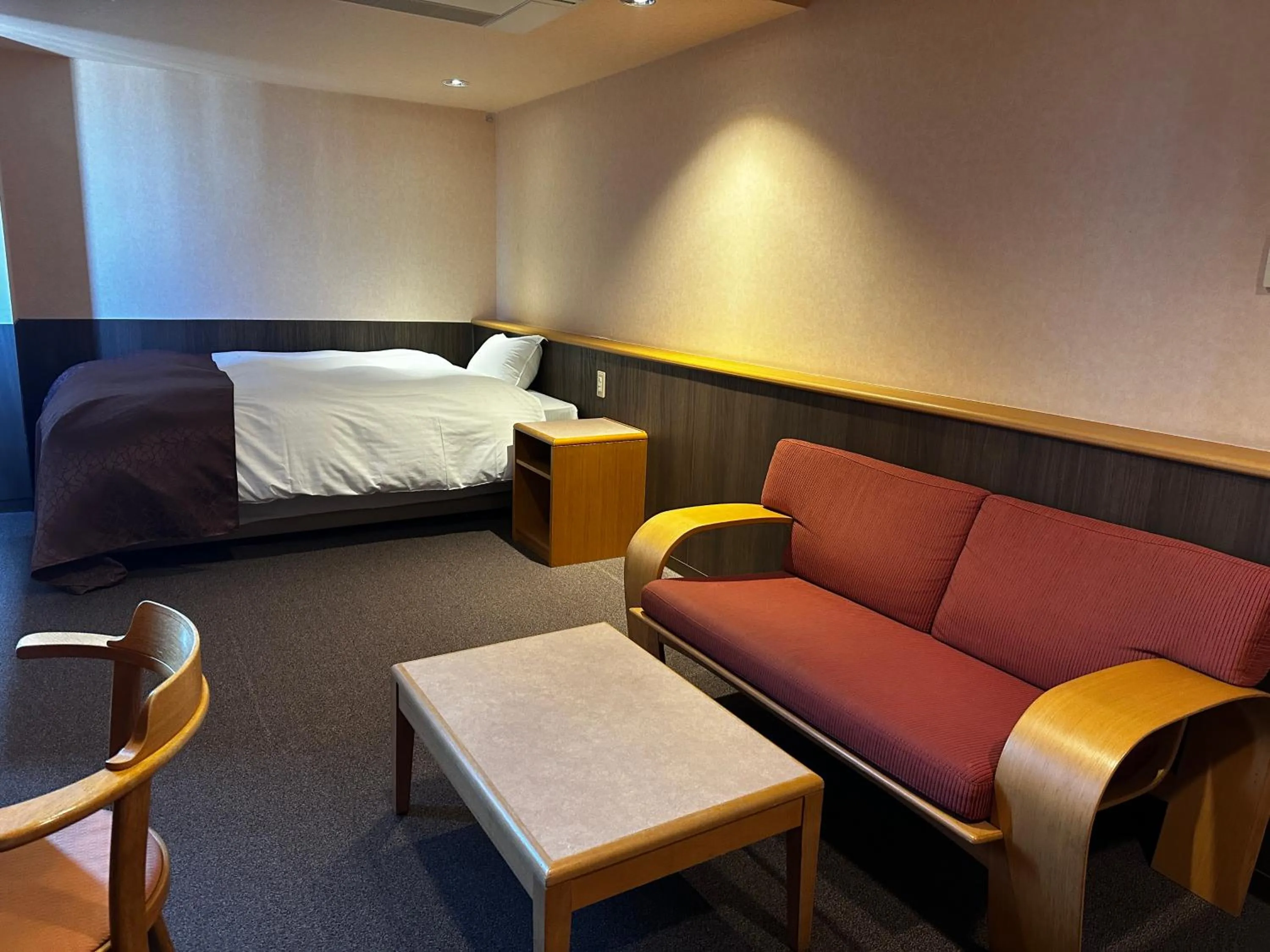 Bed in Tabist Hirosaki Touei Hotel