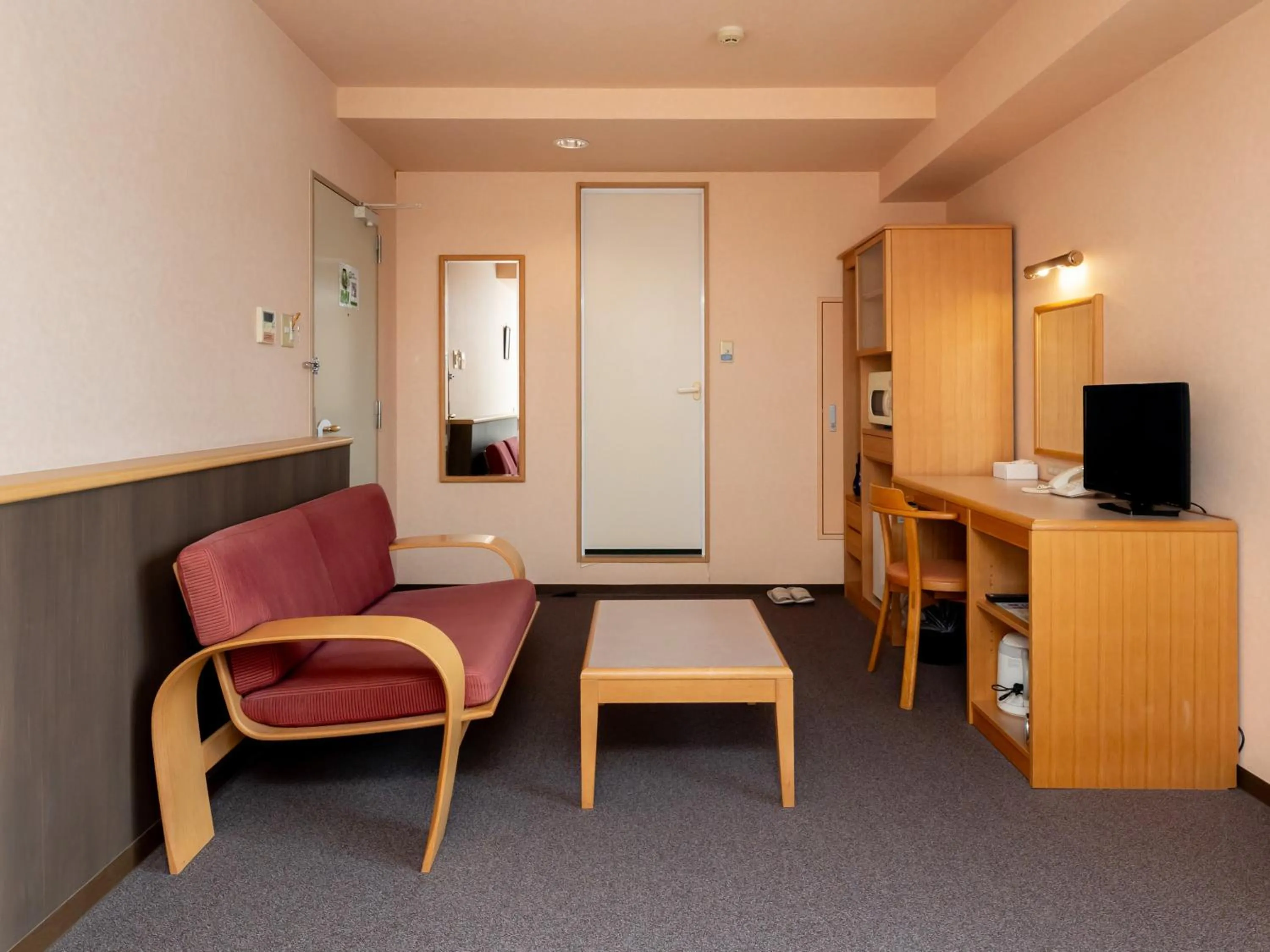 Bed in Tabist Hirosaki Touei Hotel