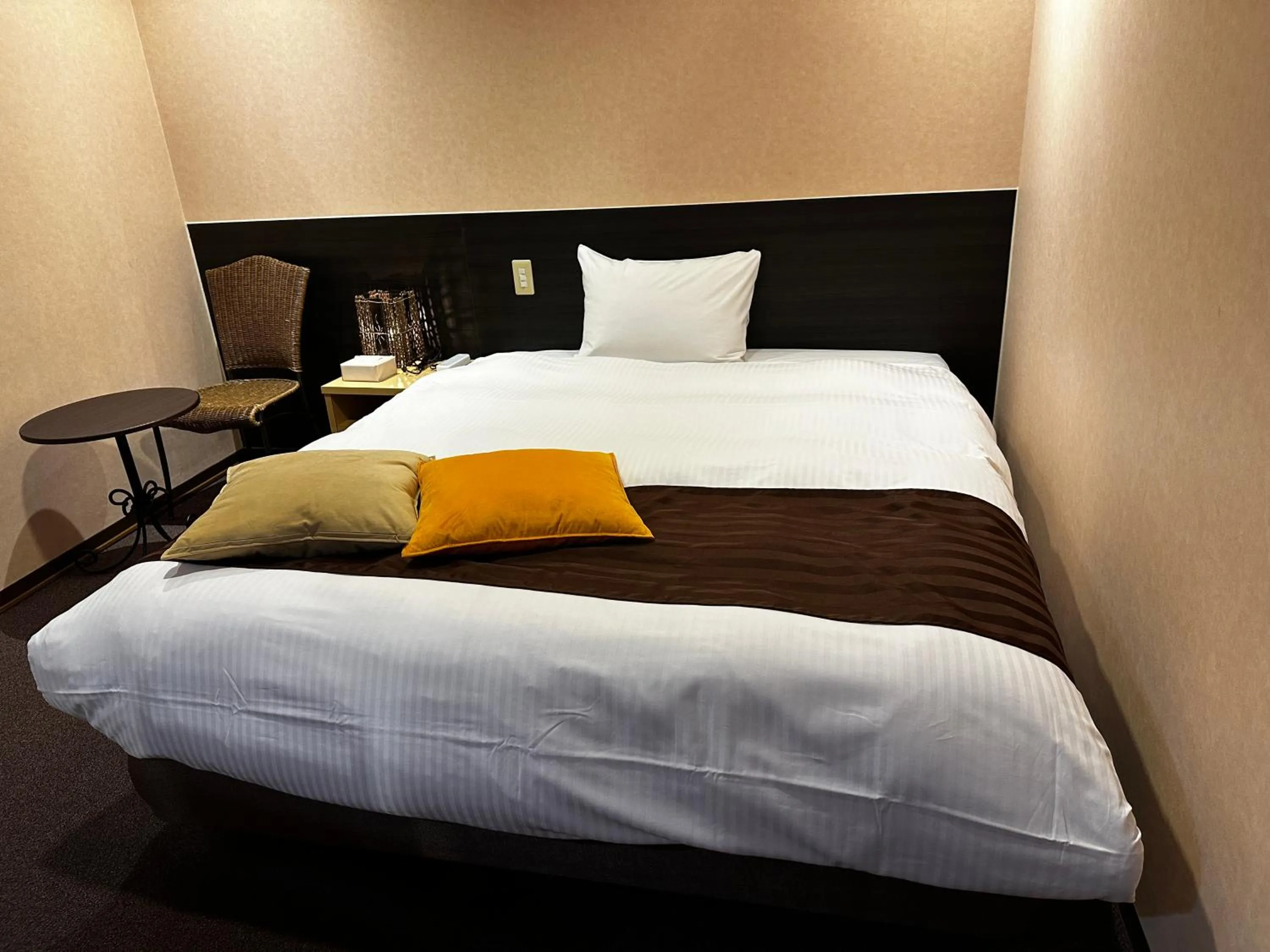 Bed in Tabist Hirosaki Touei Hotel