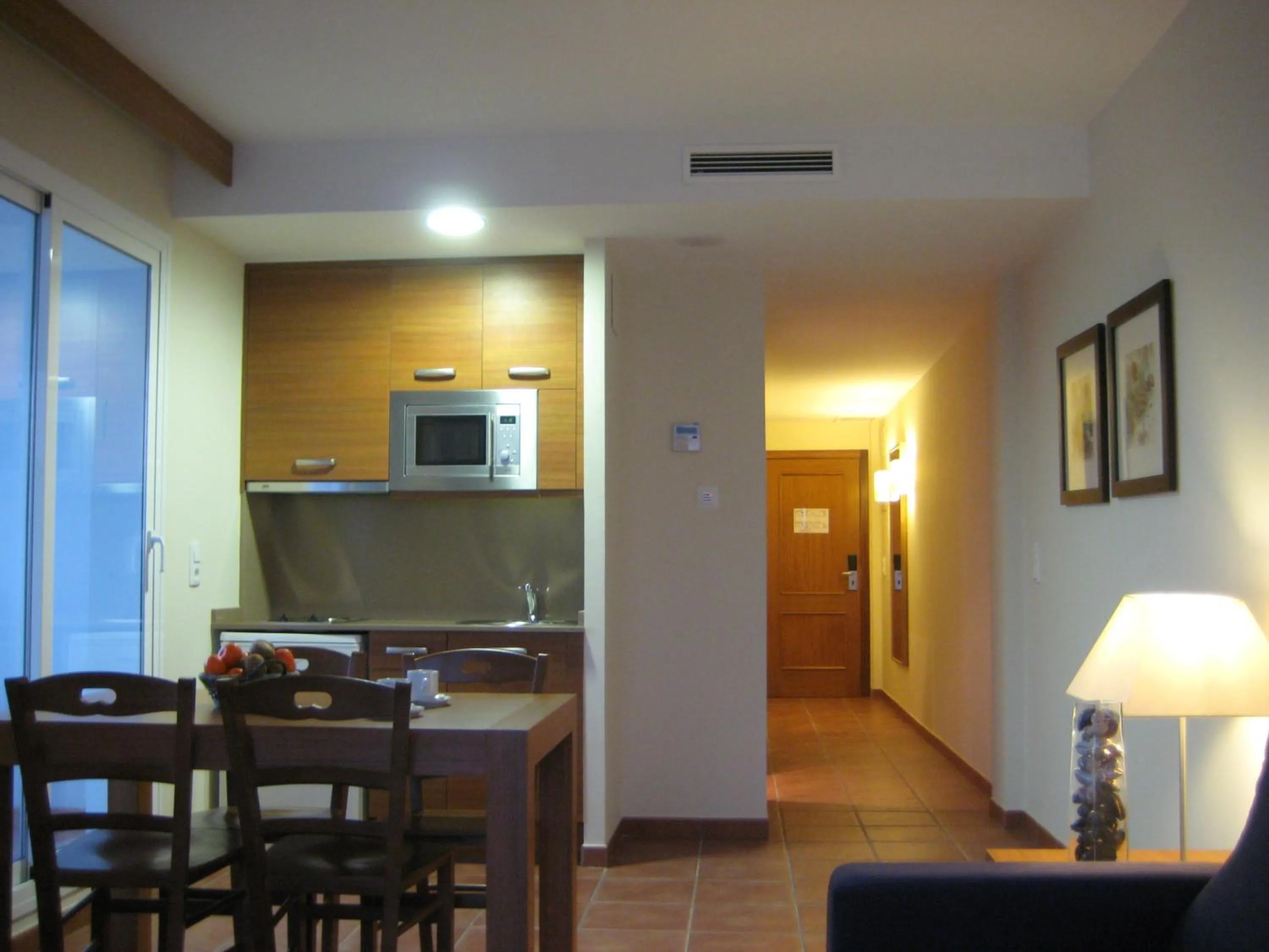 Kitchen or kitchenette in Aparthotel Puerto Mar