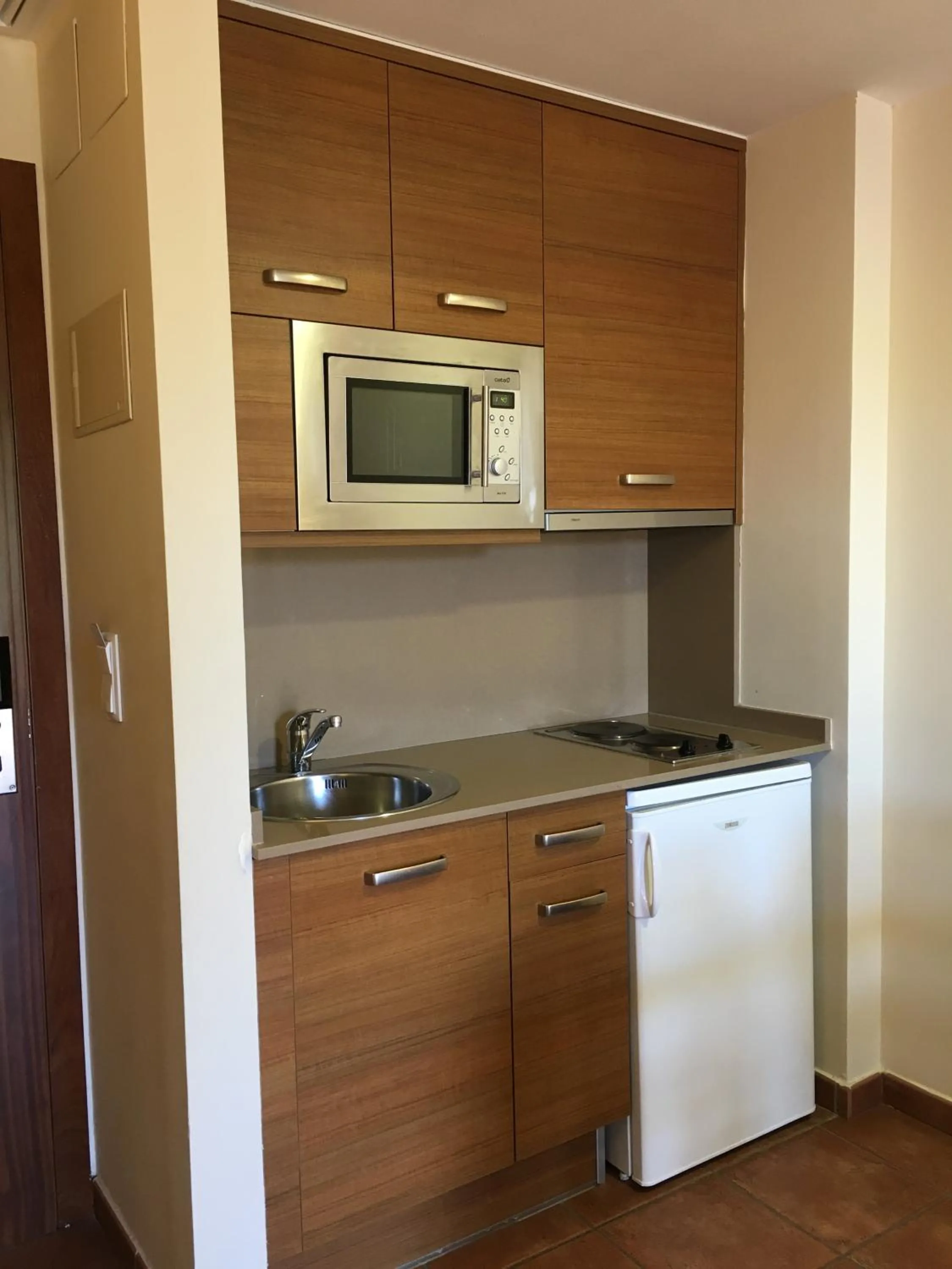 Kitchen or kitchenette in Aparthotel Puerto Mar
