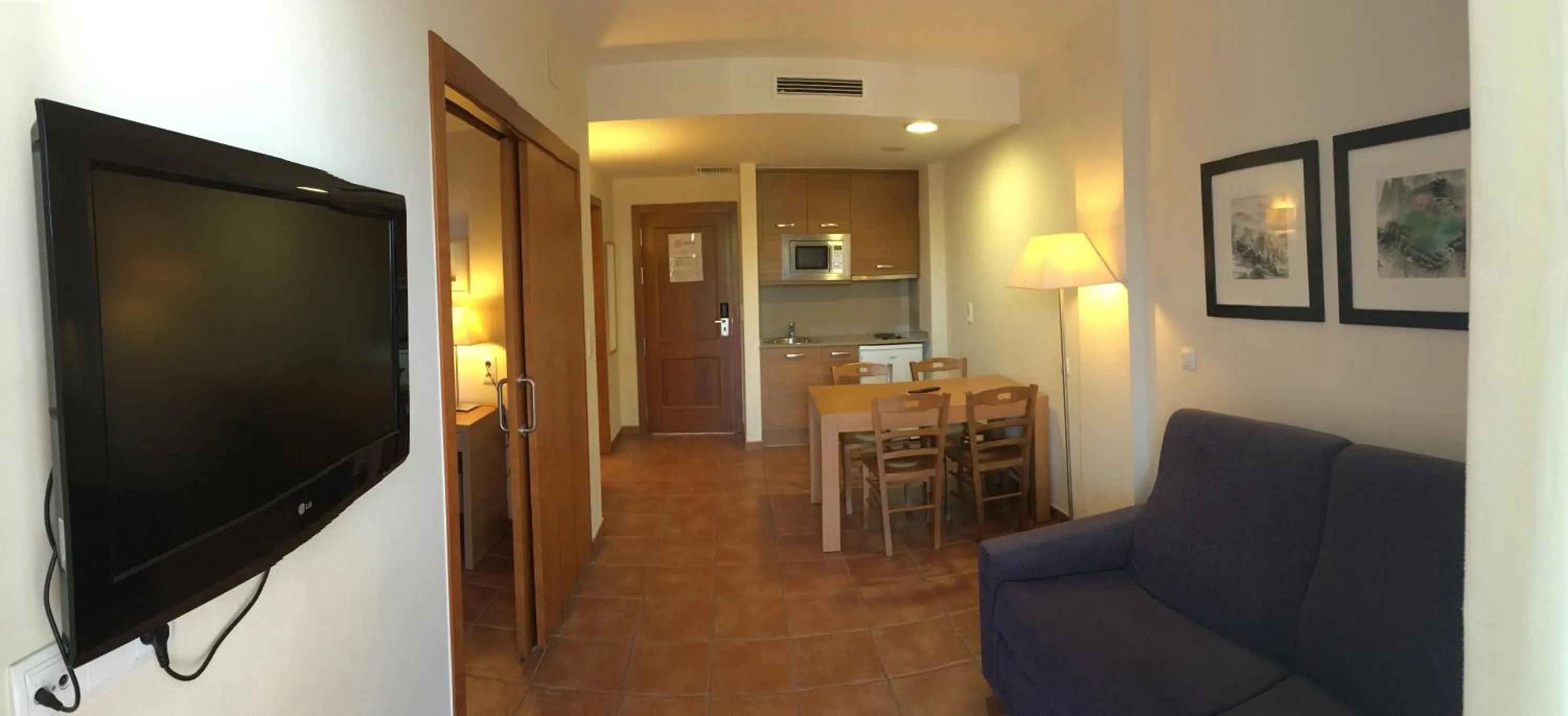 Kitchen or kitchenette in Aparthotel Puerto Mar