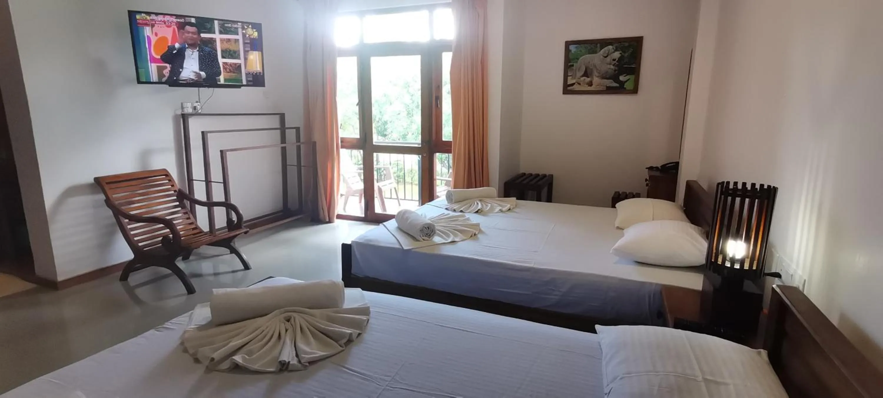 Bed in Rajarata Family Resort