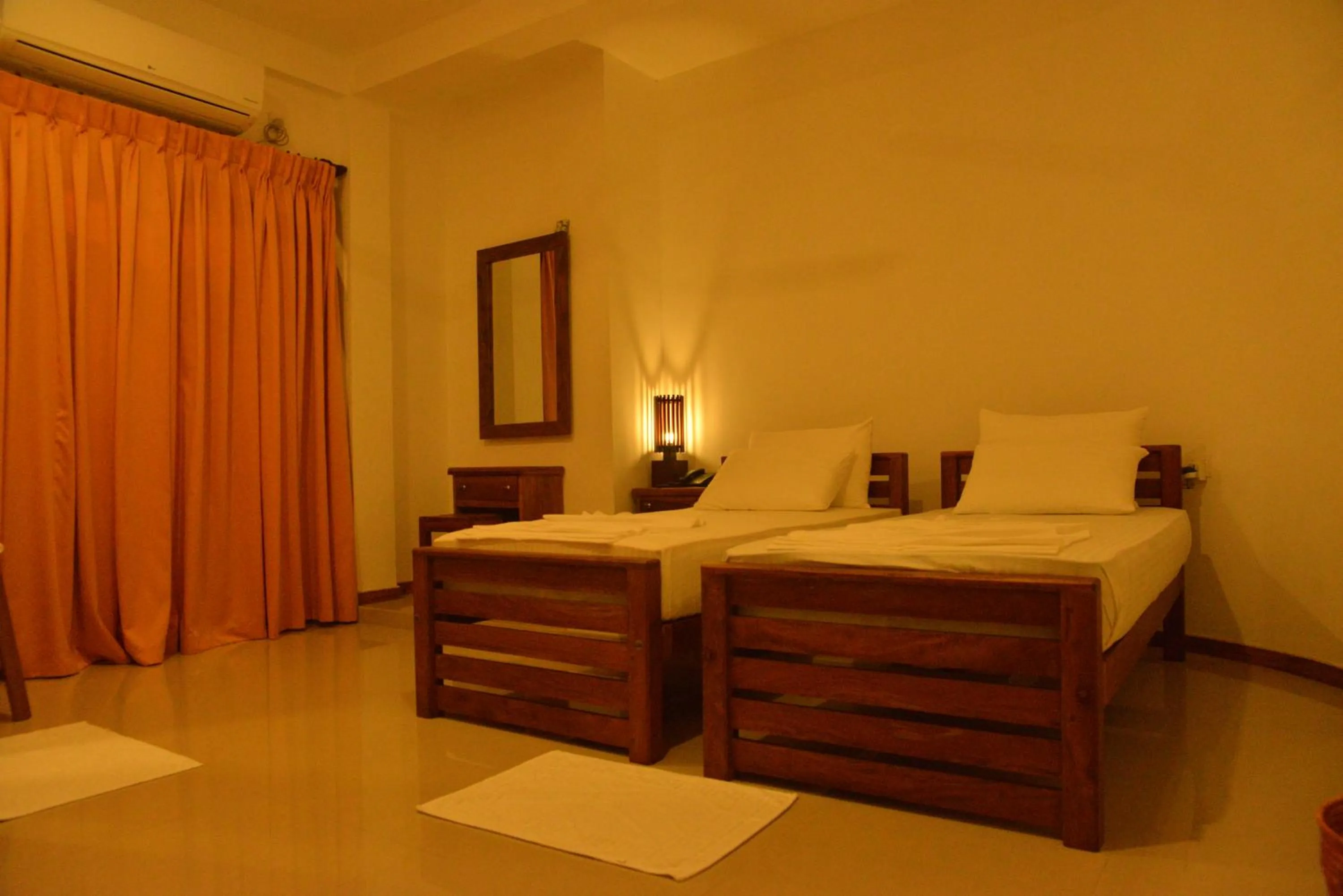 Bedroom, Bed in Rajarata Family Resort
