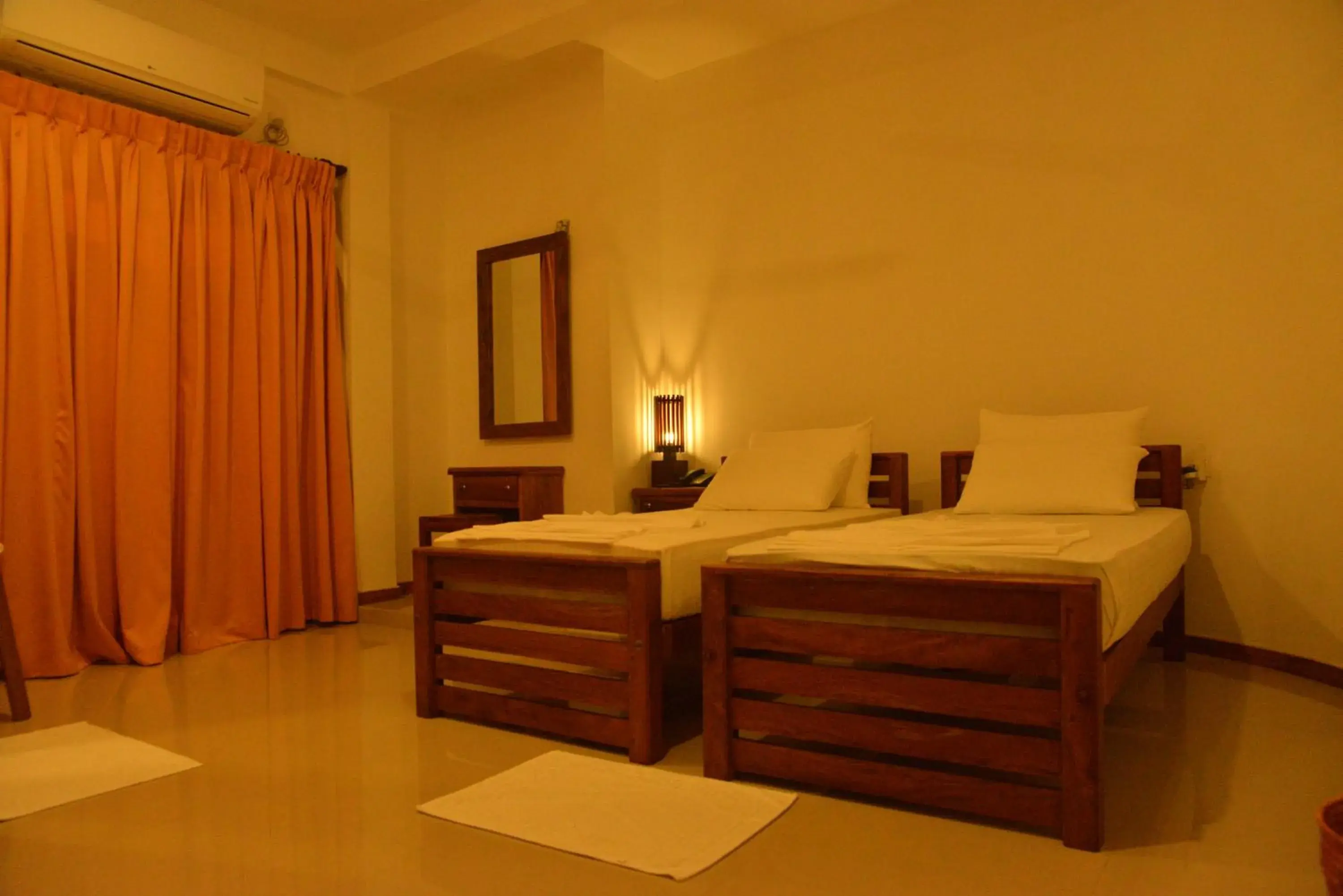 Deluxe Double Room with Balcony in Rajarata Family Resort Deluxe Double Room with Balcony in Rajarata Family Resort