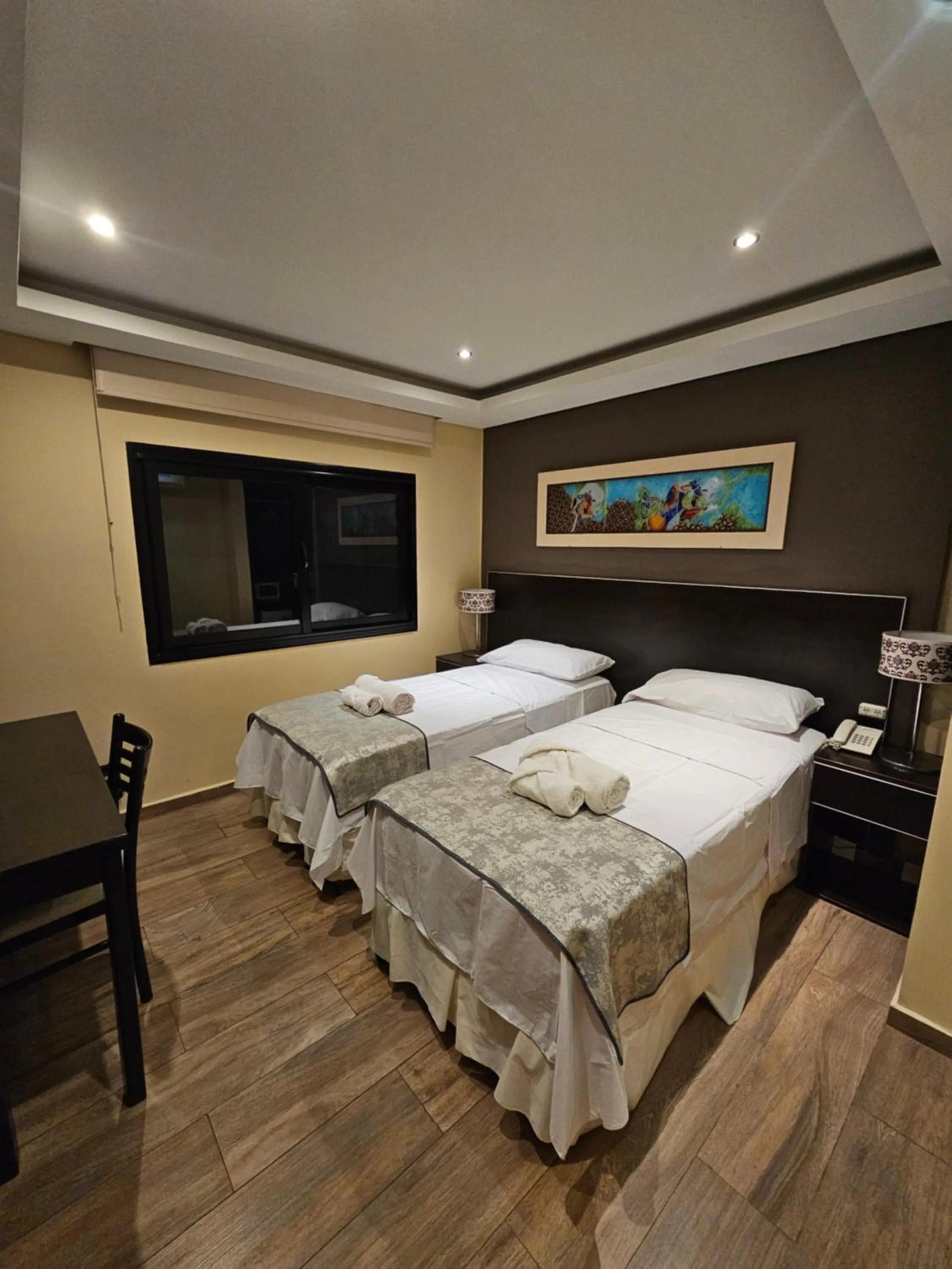 Bed in Hotel Grand Lago