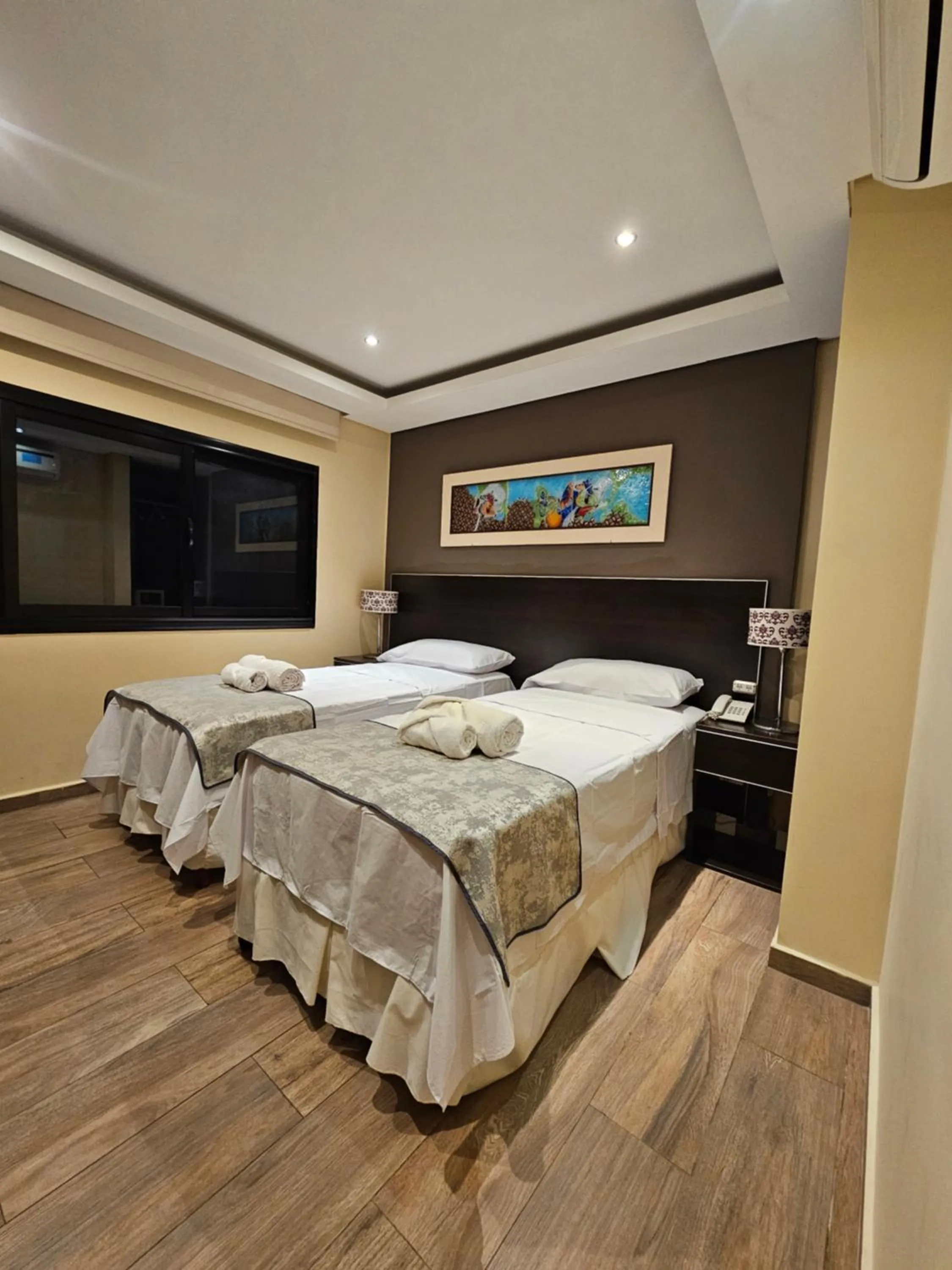 Bed in Hotel Grand Lago