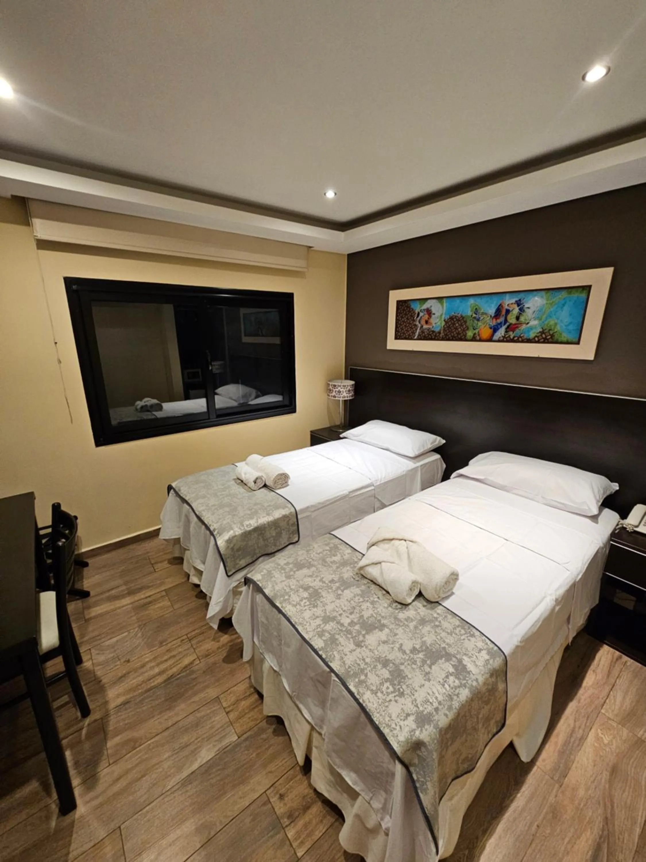 Bed in Hotel Grand Lago