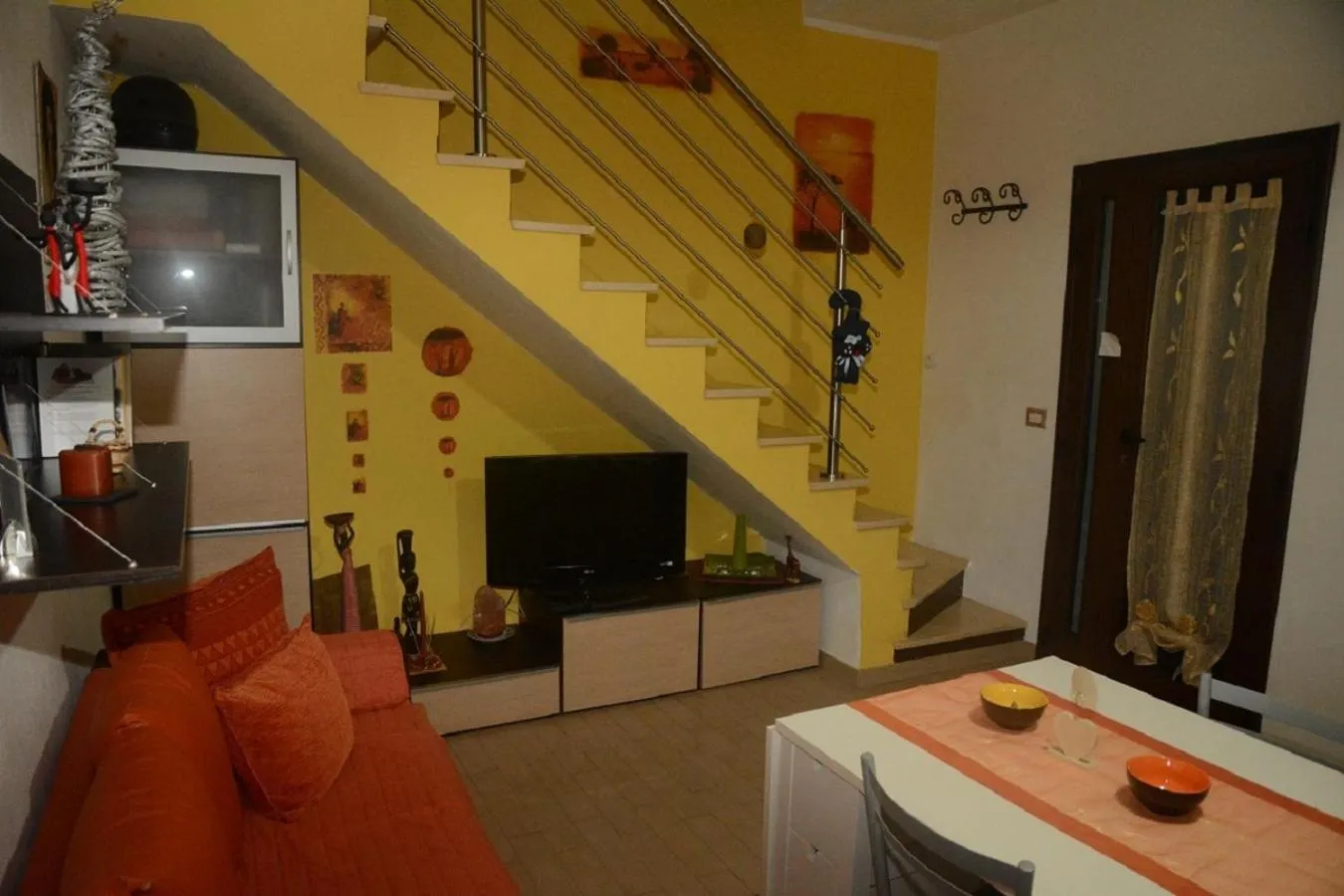 Communal lounge/ TV room in B&B Annalu'