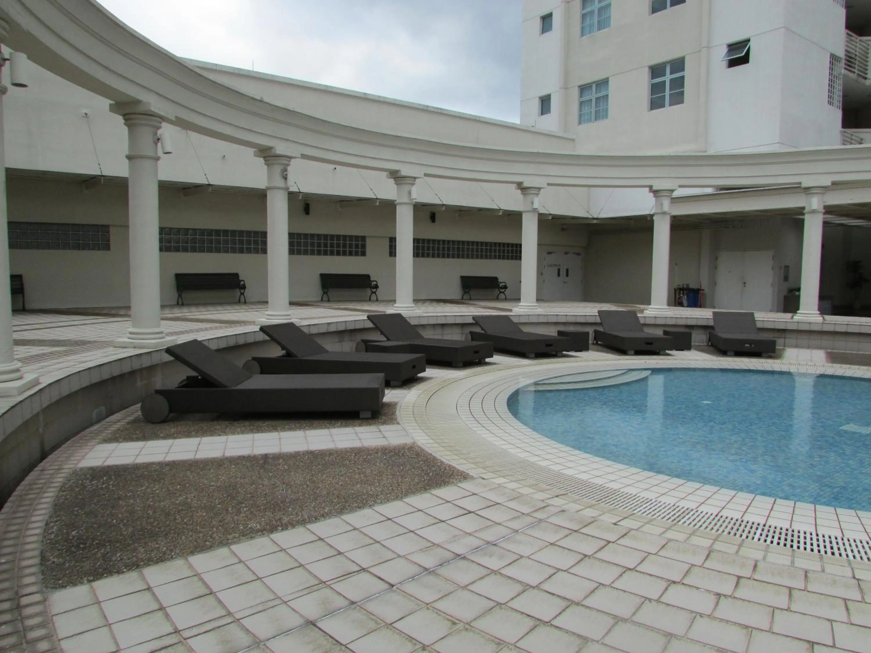 Swimming pool in Village Residence West Coast by Far East Hospitality