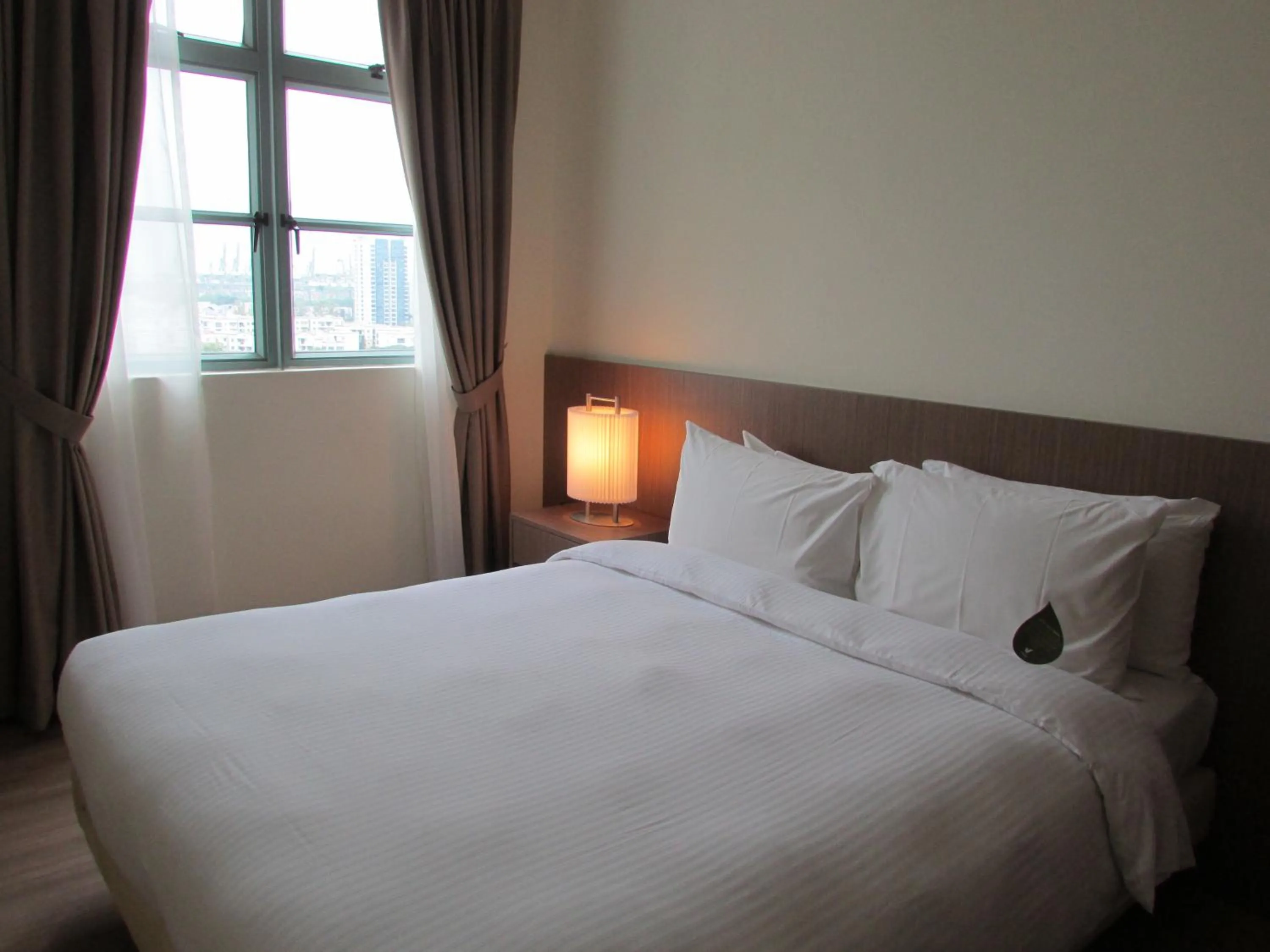 Bedroom in Village Residence West Coast by Far East Hospitality