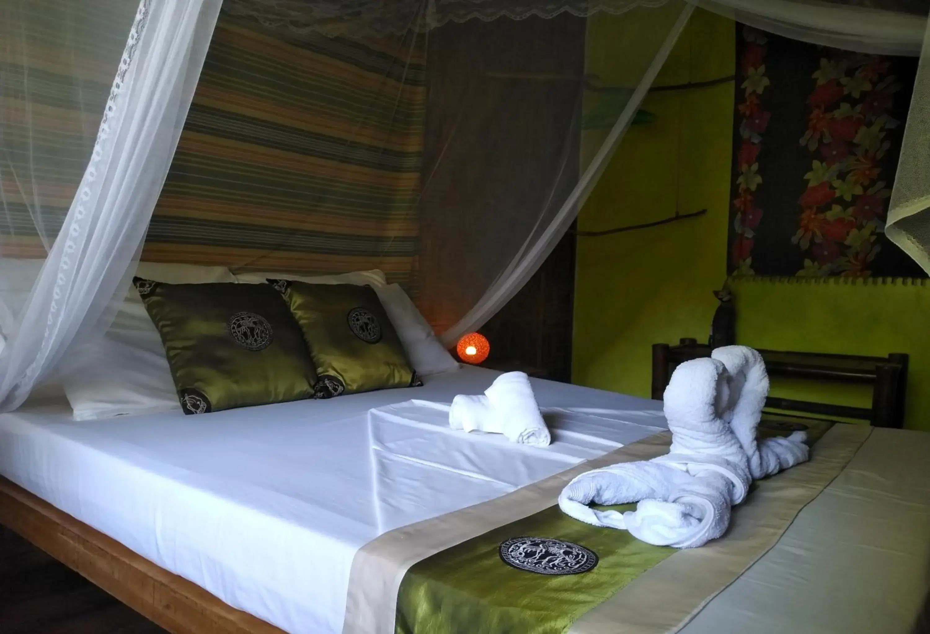 Bed in Nypa Style Resort Camiguin Bed in Nypa Style Resort Camiguin