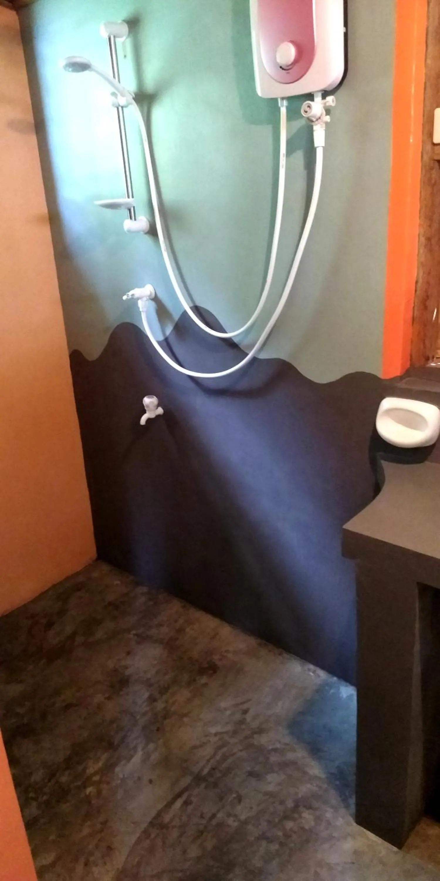 Shower in Nypa Style Resort Camiguin