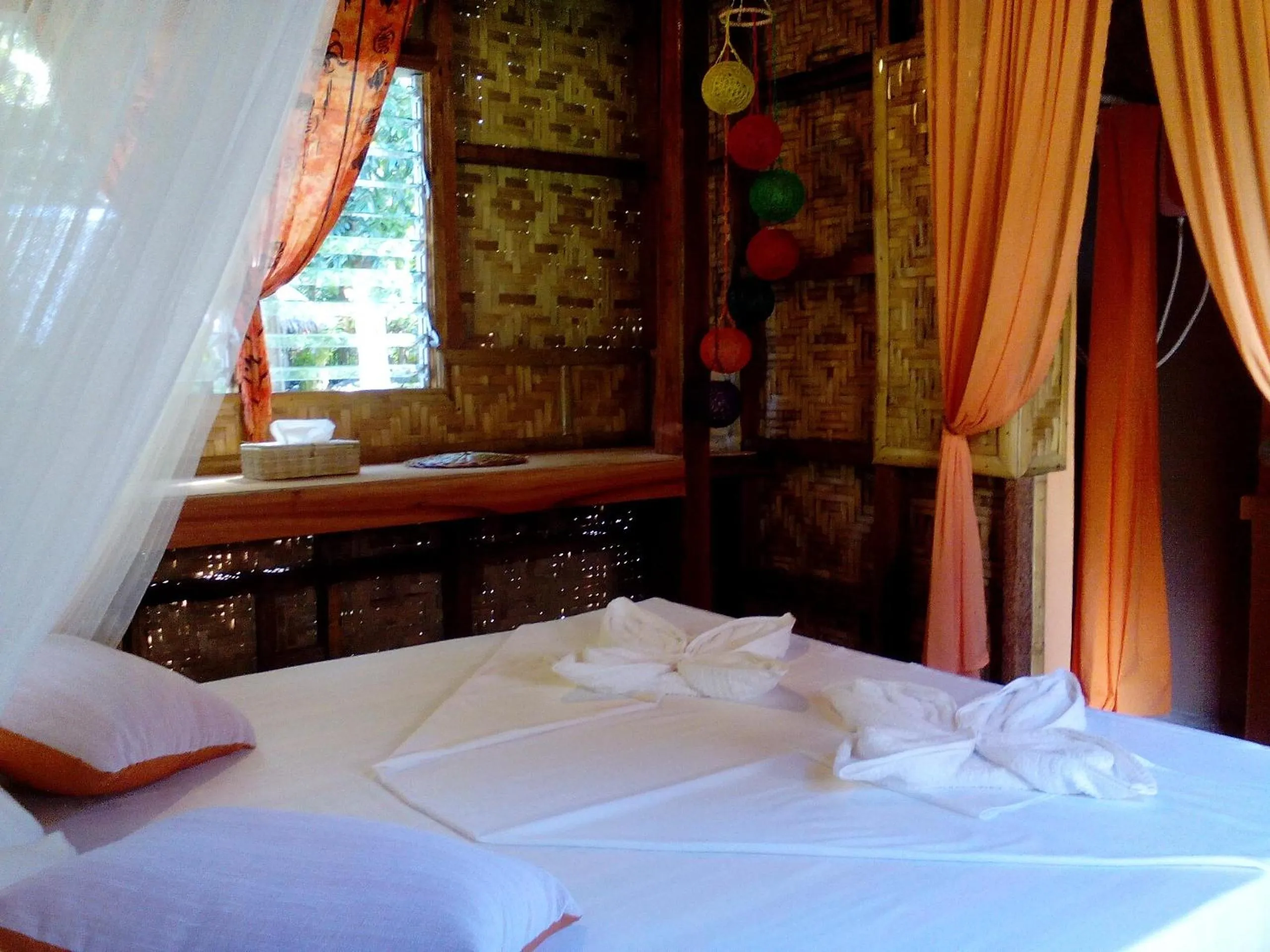 Decorative detail, Bed in Nypa Style Resort Camiguin