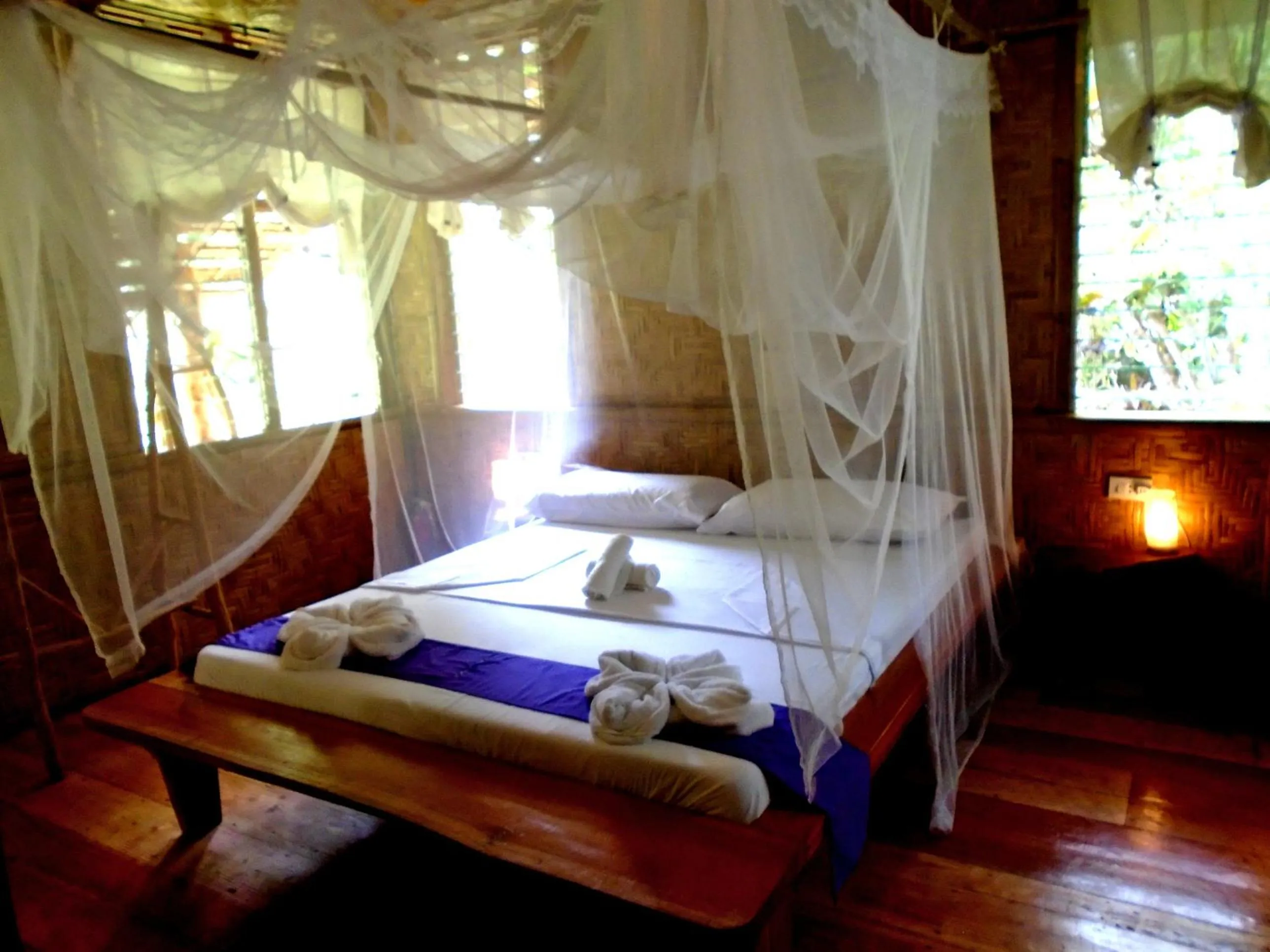 Bed in Nypa Style Resort Camiguin