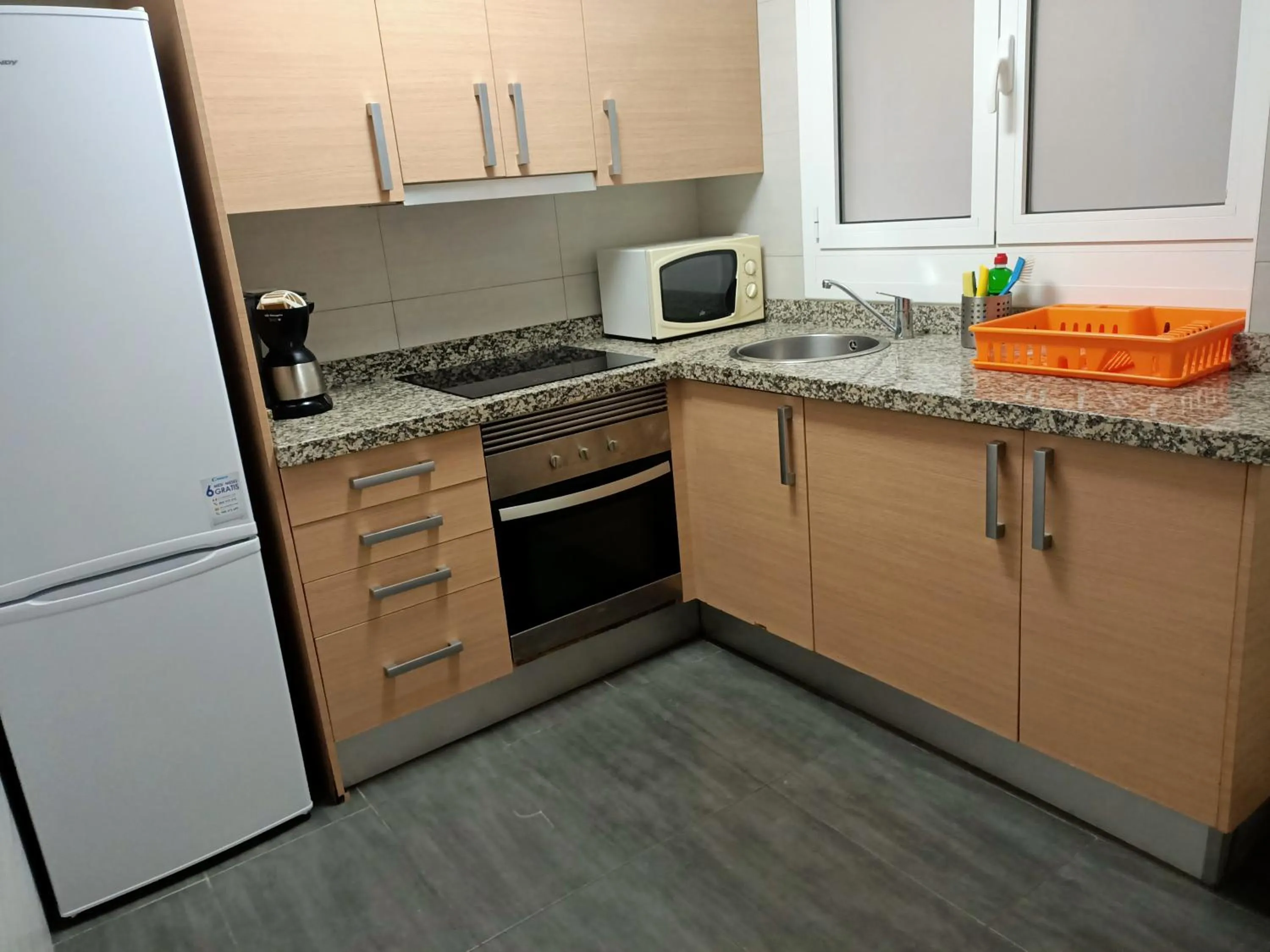 Kitchen or kitchenette in Piso Jover alojamiento en primera línea del Mar !!