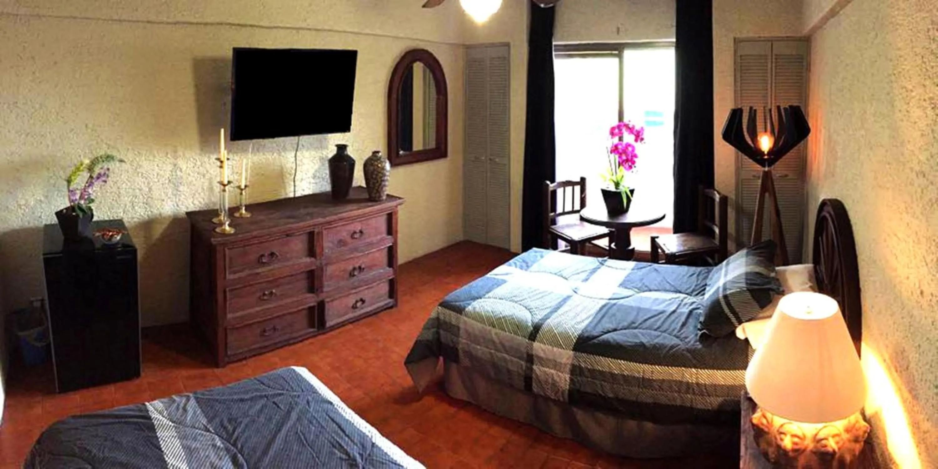 Photo of the whole room, Bed in Aurora Suites