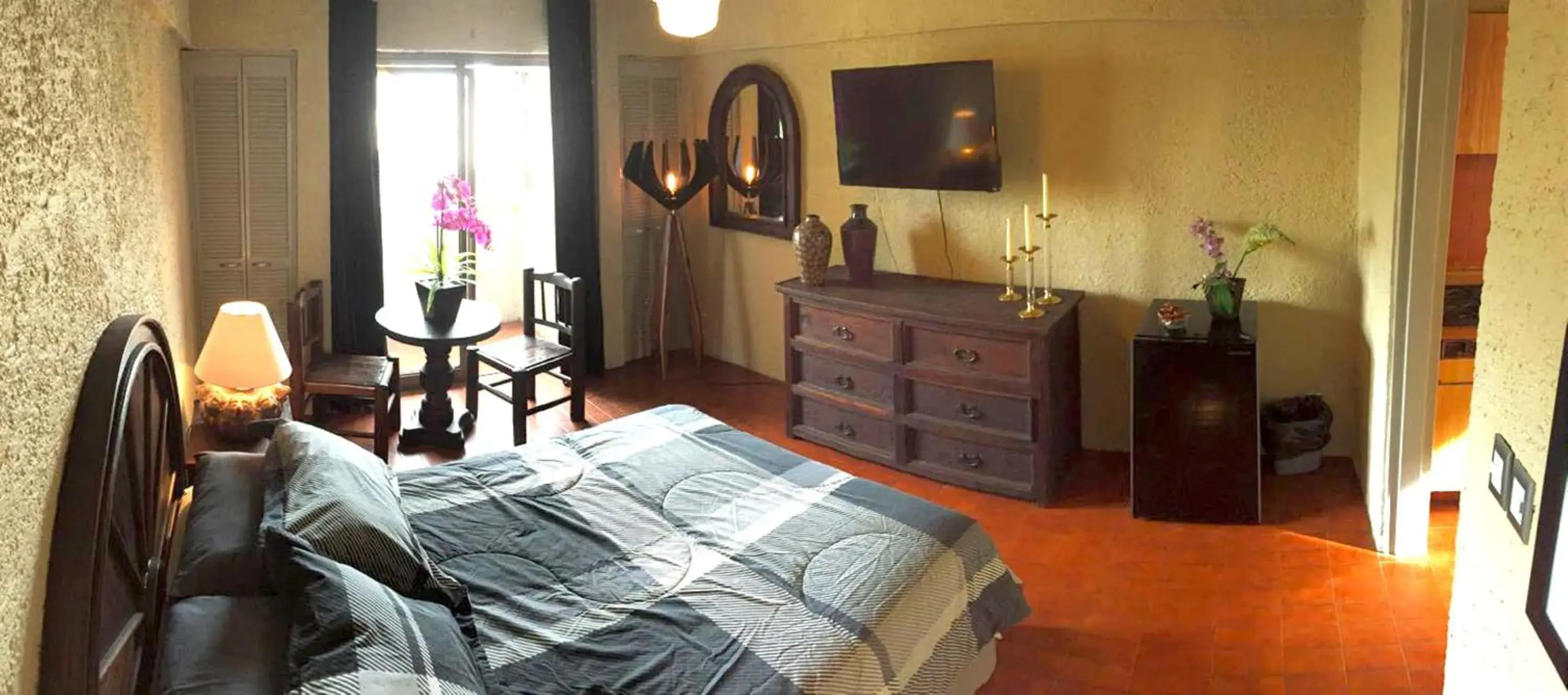 Photo of the whole room, Bed in Aurora Suites Photo of the whole room, Bed in Aurora Suites