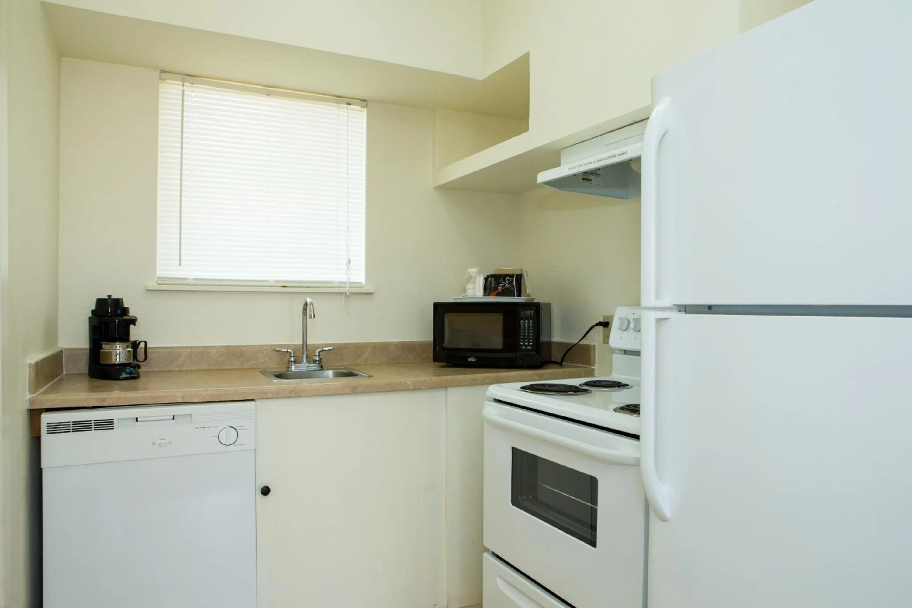 Kitchen or kitchenette in Sands Inn & Suites