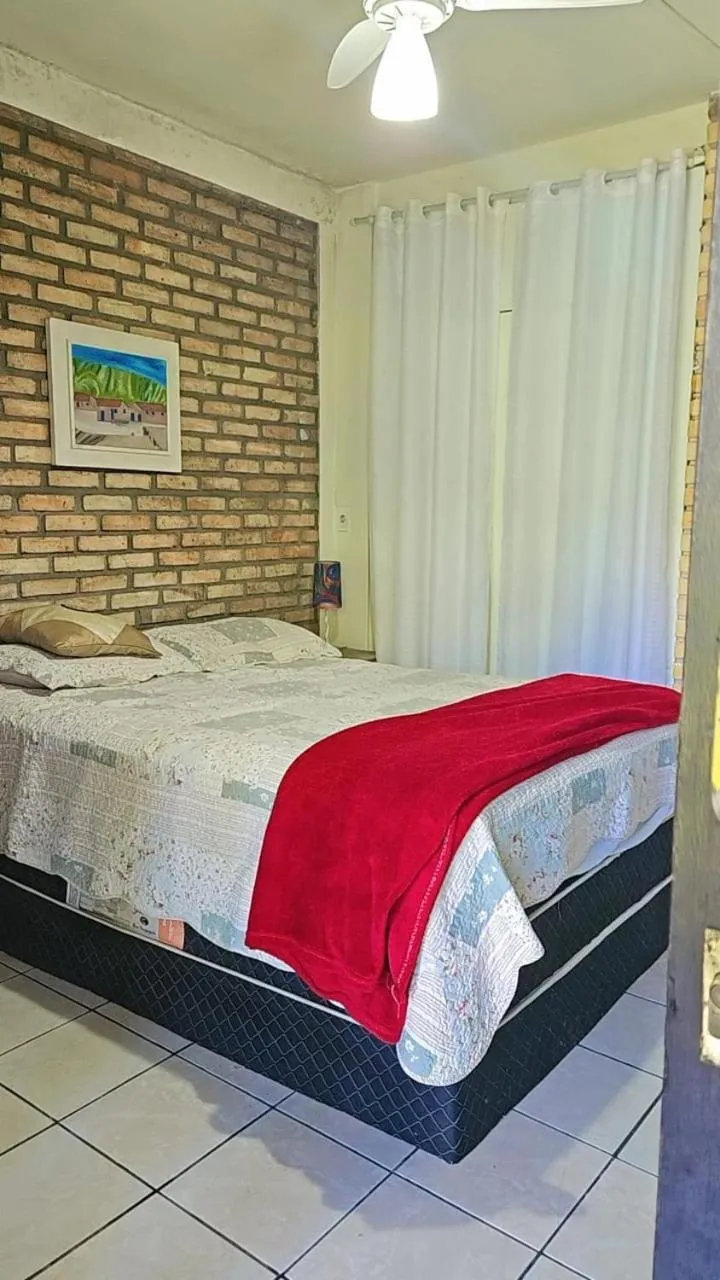 Bed in Pousada Marujo