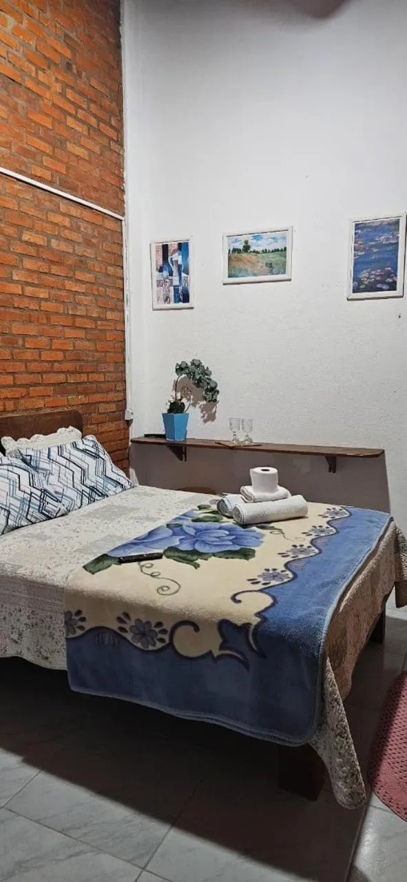 Bed in Pousada Marujo