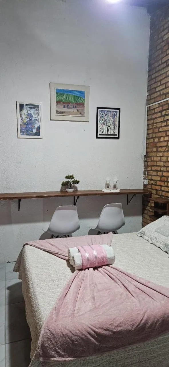 Bed in Pousada Marujo