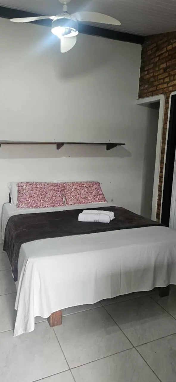 Bed in Pousada Marujo