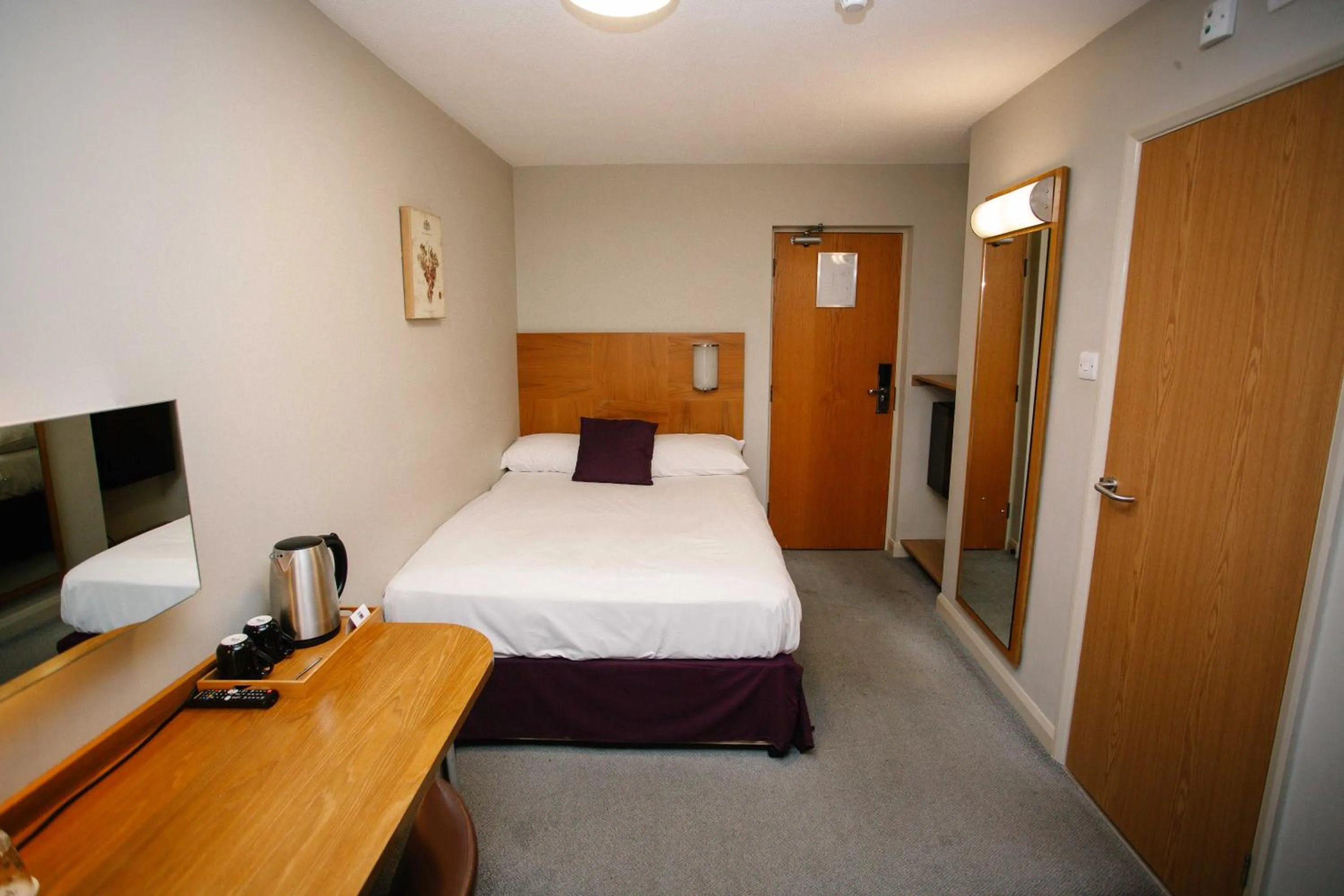 Bed in The Corner House Hotel