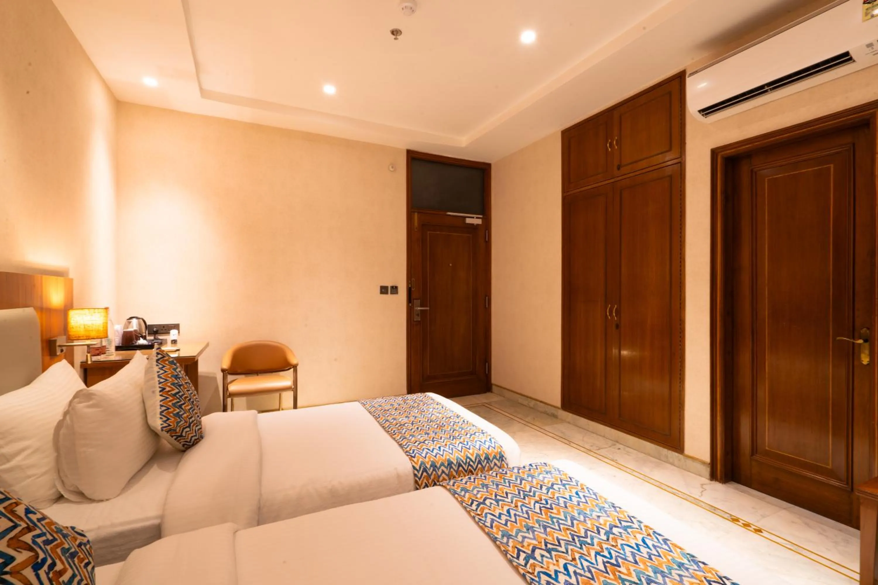 Bedroom, Bed in Hotel Bluestone Prime Nehru Place by The Cosy hotels