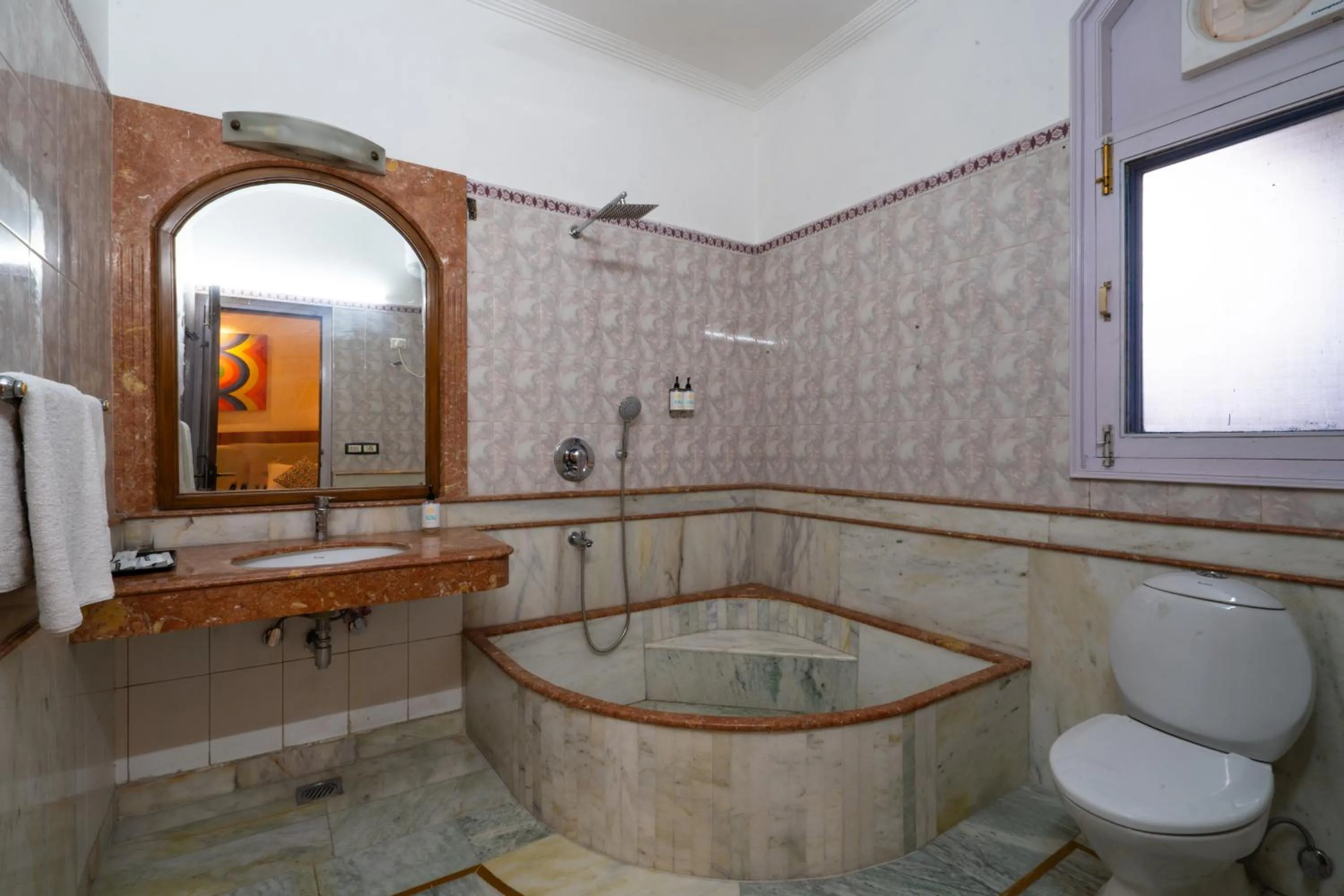 Bathroom in Hotel Bluestone Prime Nehru Place by The Cosy hotels