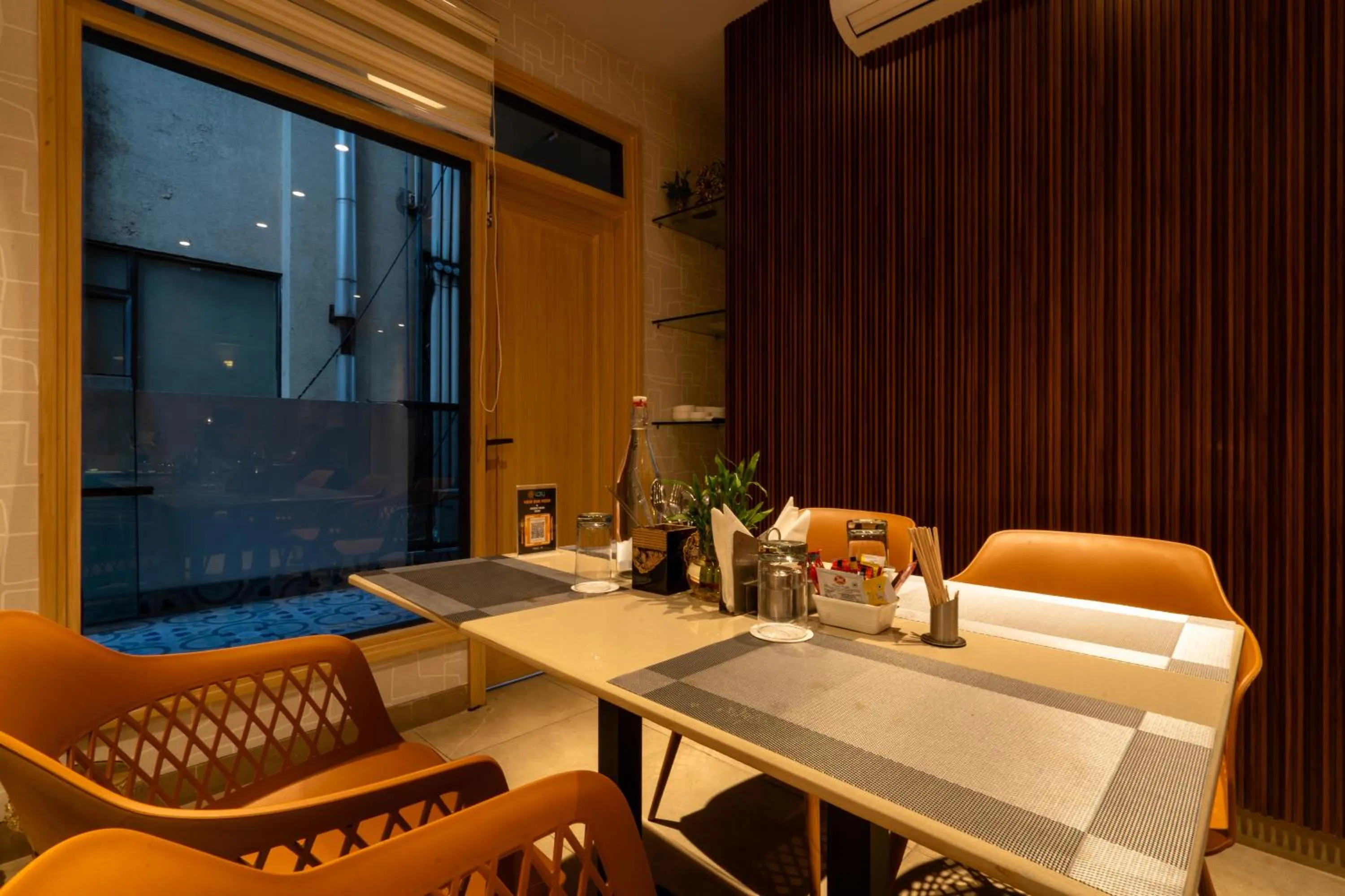 Seating area in Hotel Bluestone Prime Nehru Place by The Cosy hotels