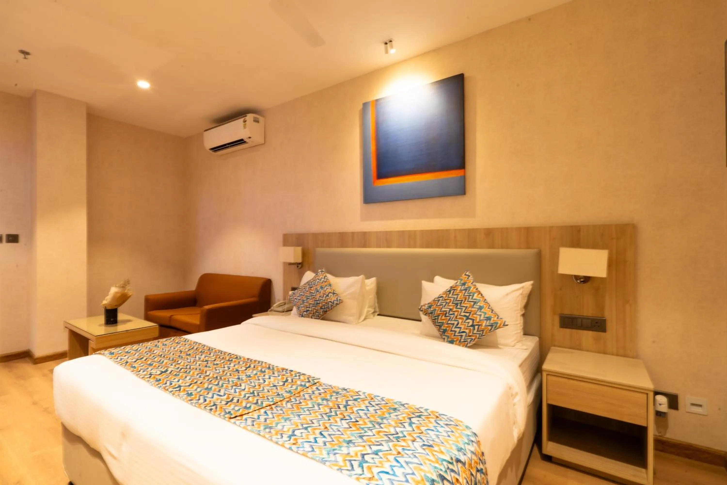 Photo of the whole room, Bed in Hotel Bluestone Prime Nehru Place by The Cosy hotels