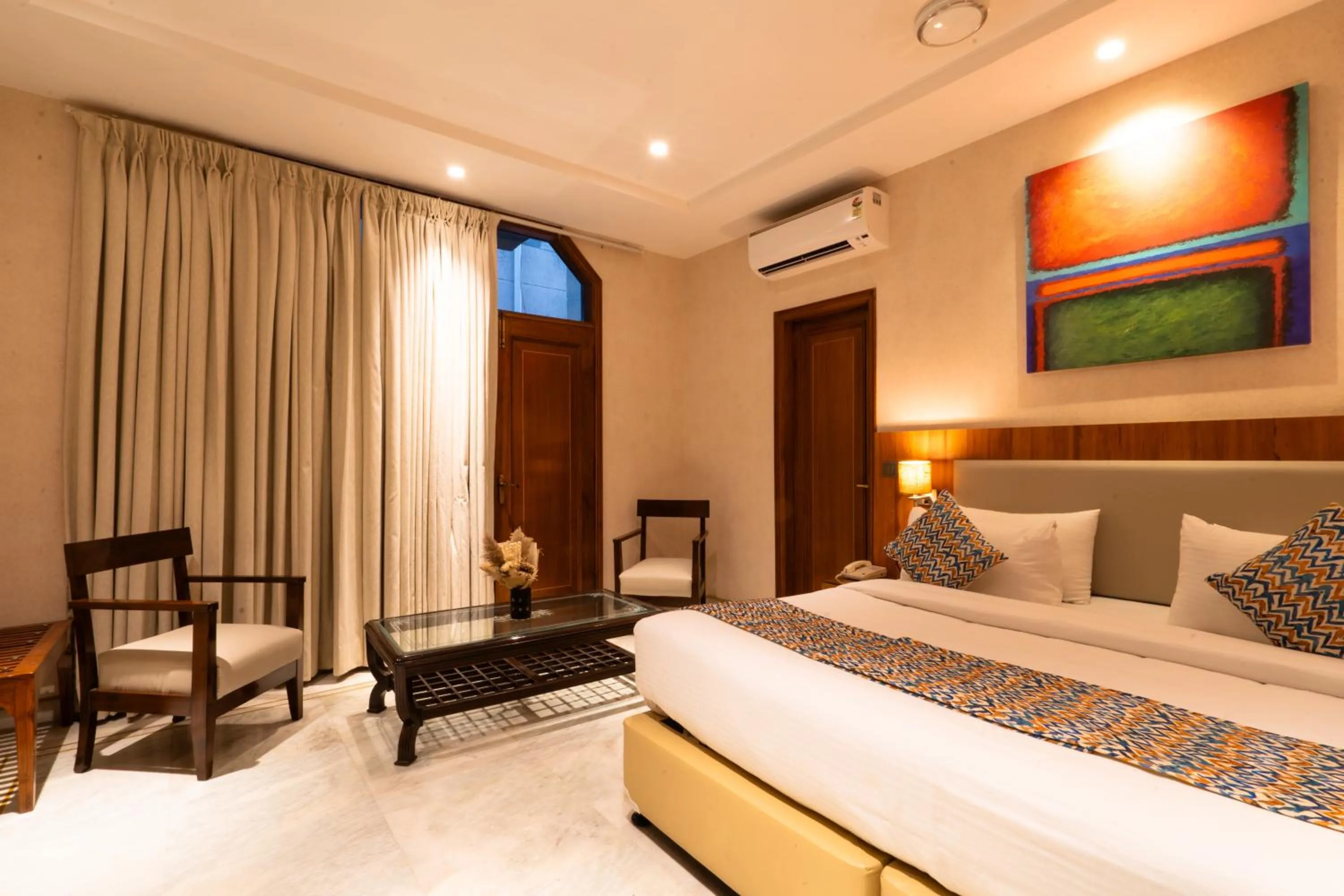 Photo of the whole room, Bed in Hotel Bluestone Prime Nehru Place by The Cosy hotels