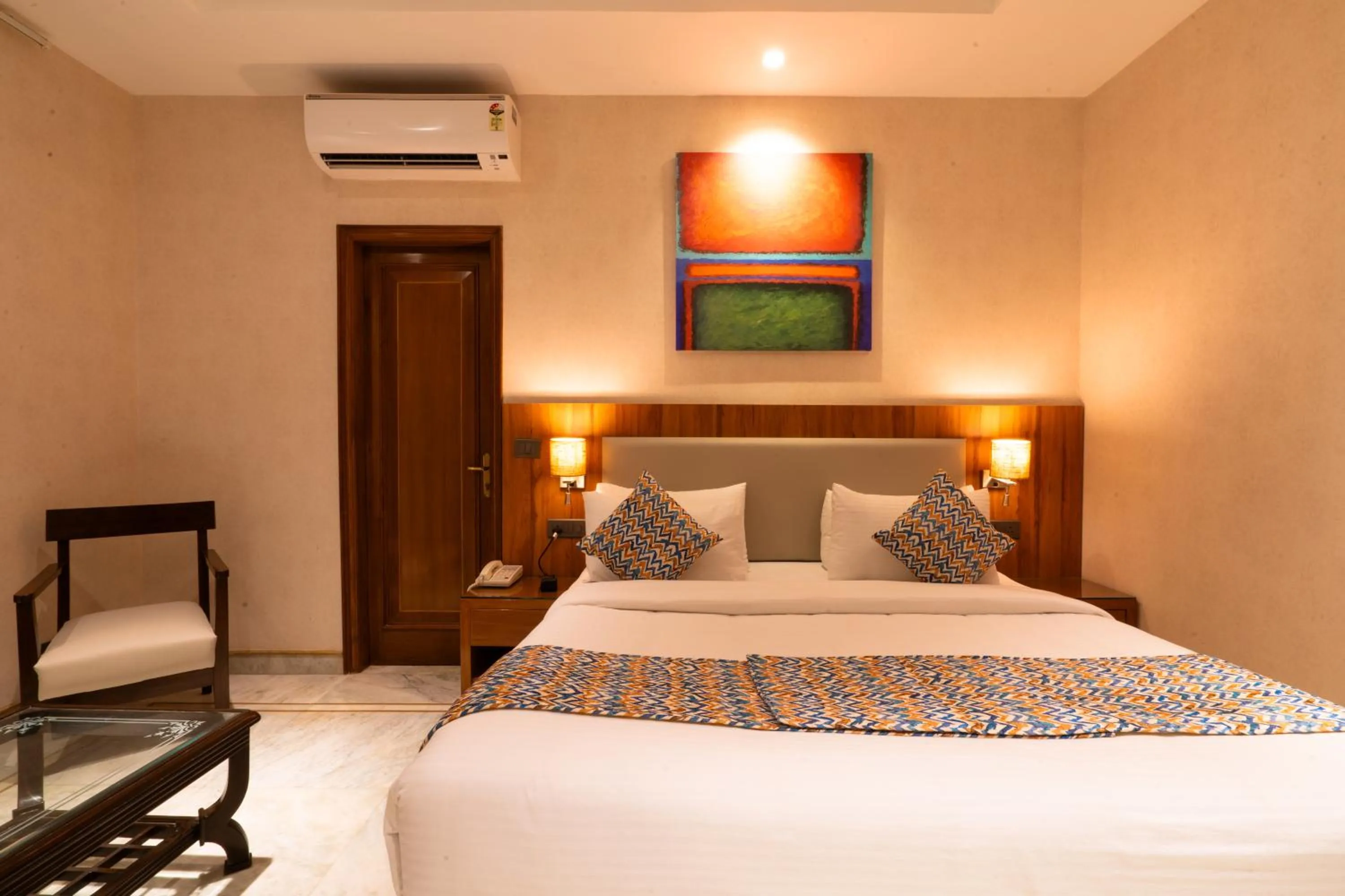 Photo of the whole room, Bed in Hotel Bluestone Prime Nehru Place by The Cosy hotels