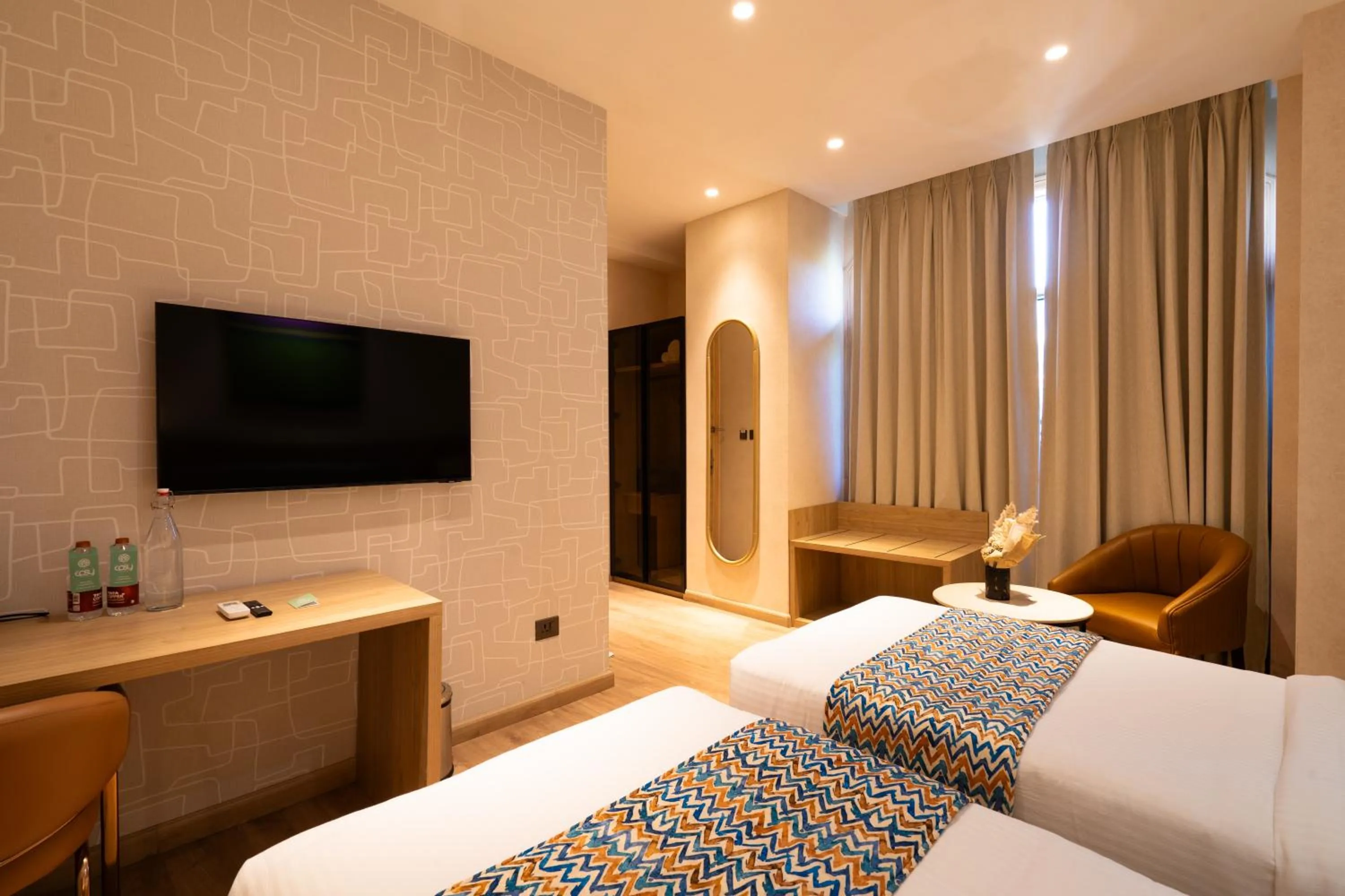Photo of the whole room, Bed in Hotel Bluestone Prime Nehru Place by The Cosy hotels